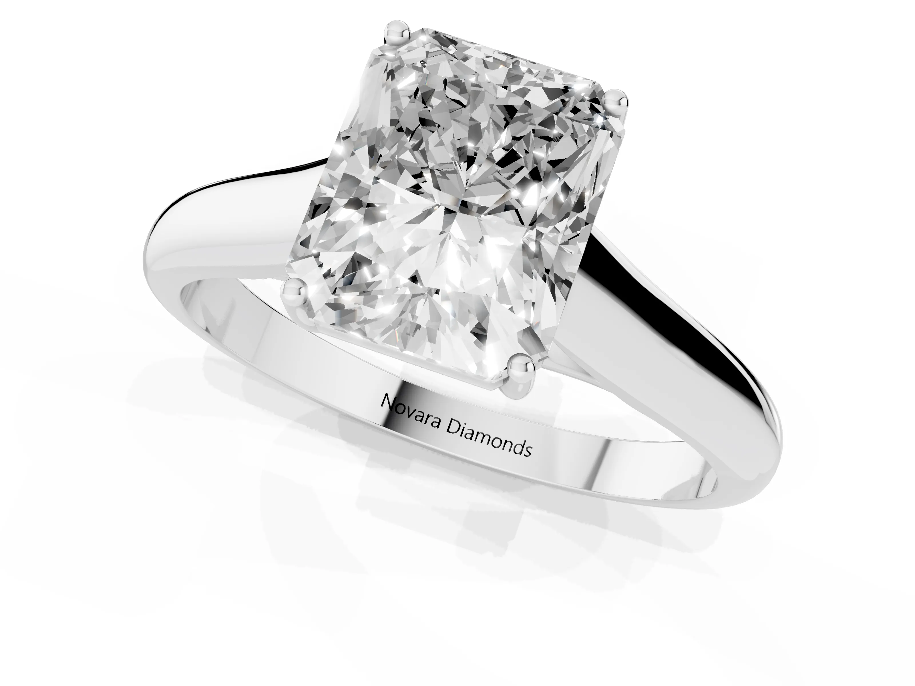 Radiant Cut Diamond Solitaire Engagement Ring Set in Silver with Subtly Tapered Band and Prong Setting