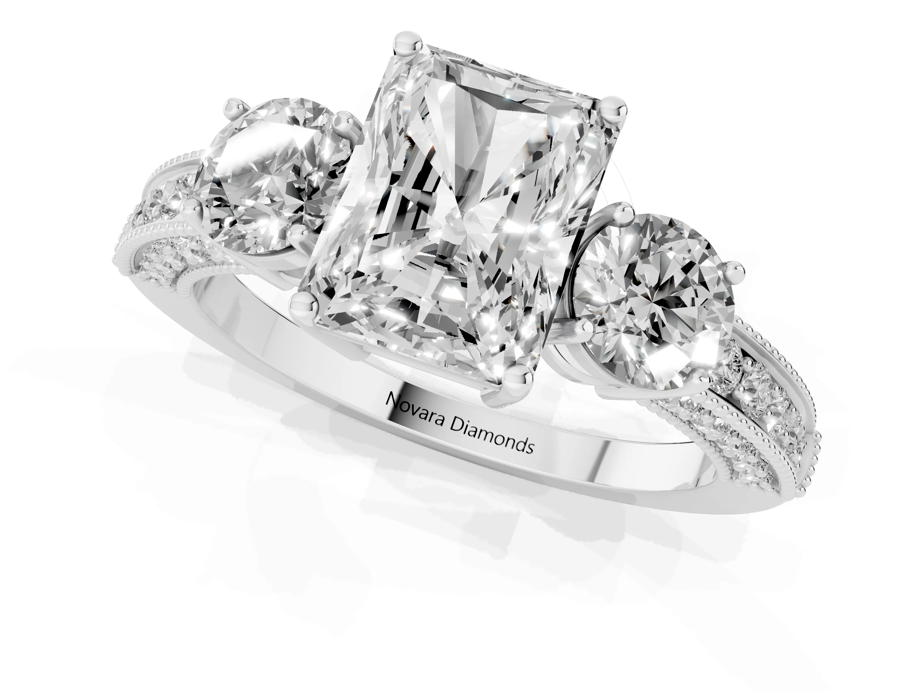 Radiant Cut Diamond Three-Stone Ring Set in White gold with Round Side Stones and Pavé Band