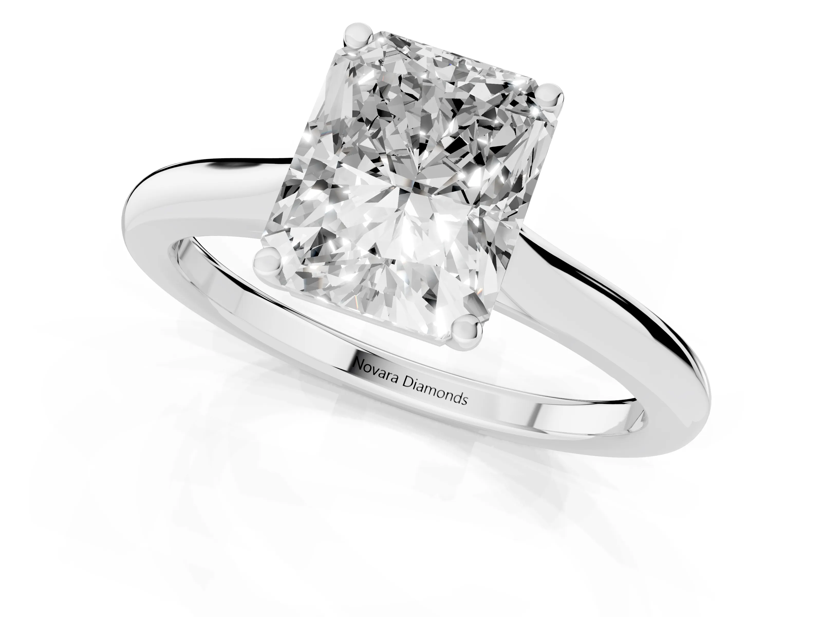 Radiant Cut Diamond Solitaire Ring Set in Silver with Cathedral Band and Prong Setting
