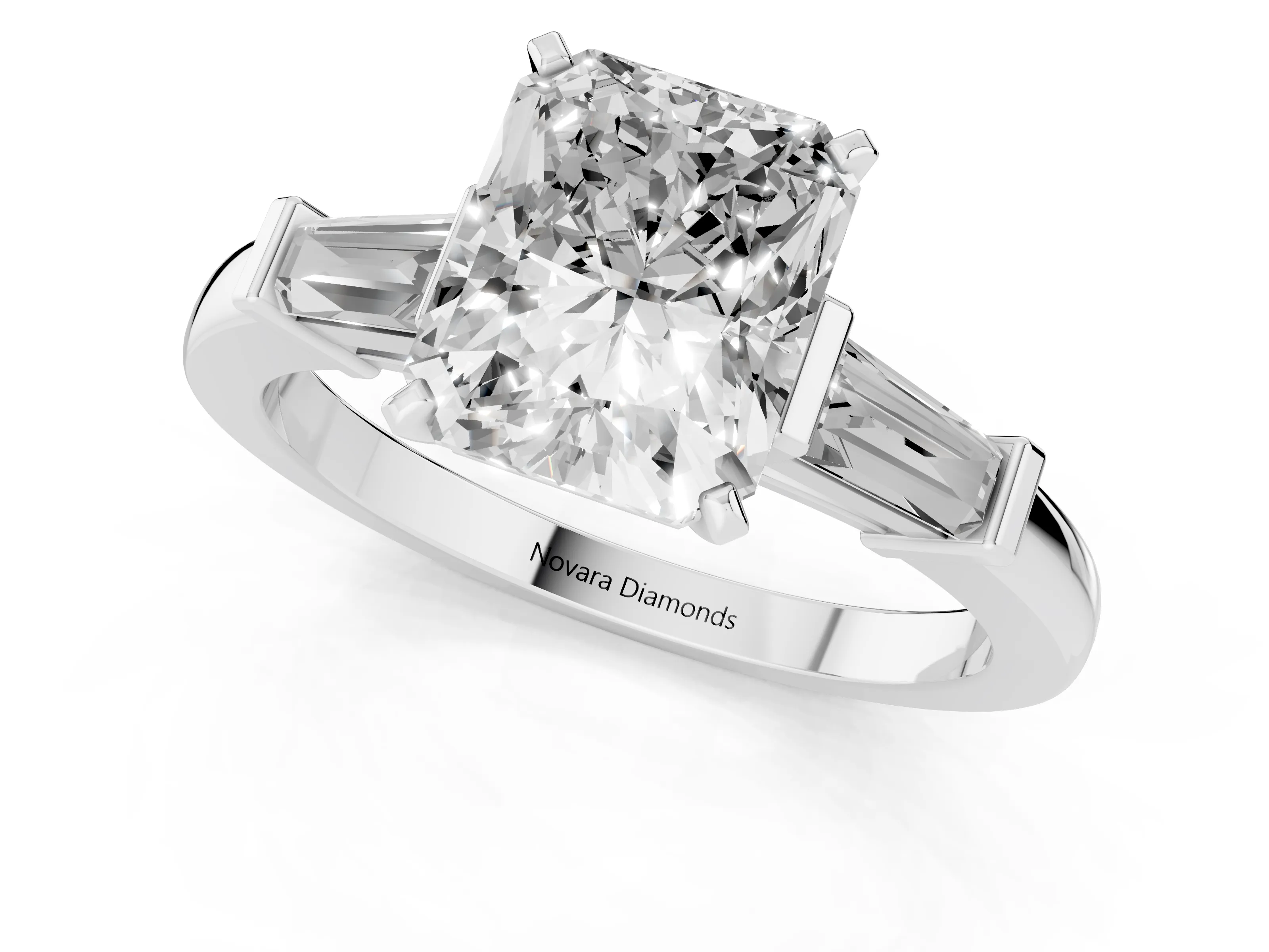Radiant Cut Diamond Solitaire Ring Set in Platinum with Tapered Baguette Accents and Prong Setting