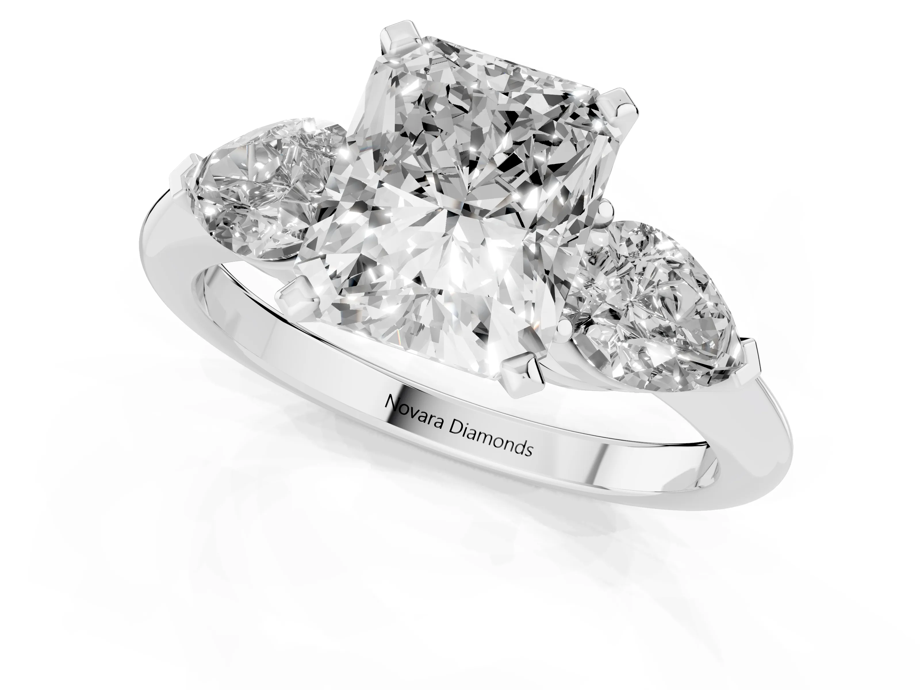 Three-Stone Radiant Cut Diamond Ring Set in Silver with Pear Side Stones and Prong Setting