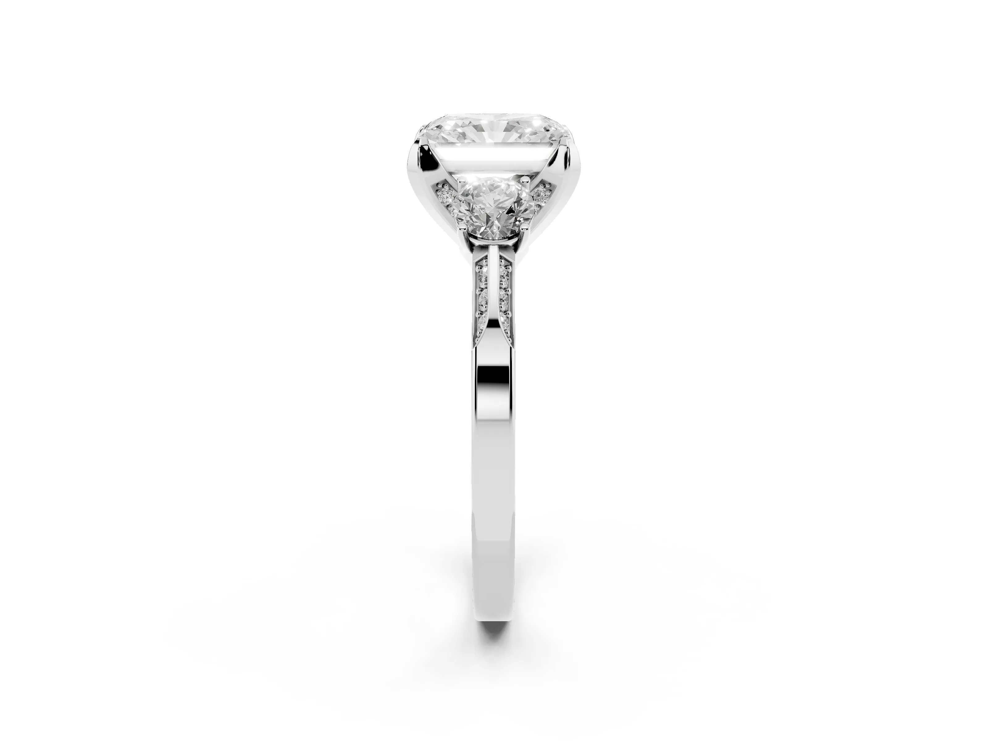 Radiant Cut Diamond Three-Stone Ring Set in Platinum with Pavé Band and Smaller Side Stones