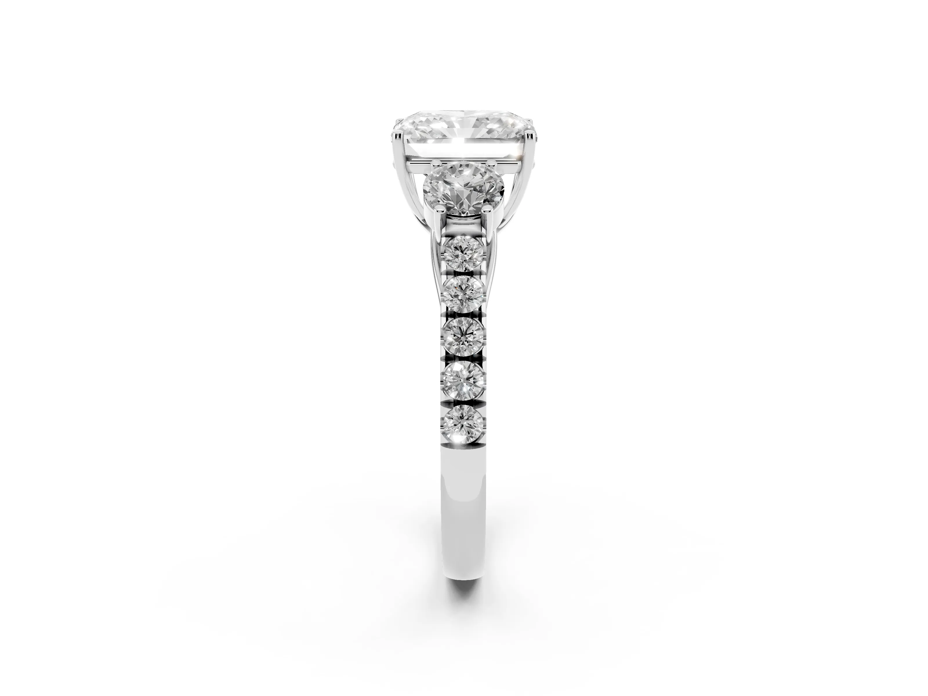 Radiant Cut Diamond Three-Stone Ring Set in Platinum with Round Side Stones and Delicate Pavé Band