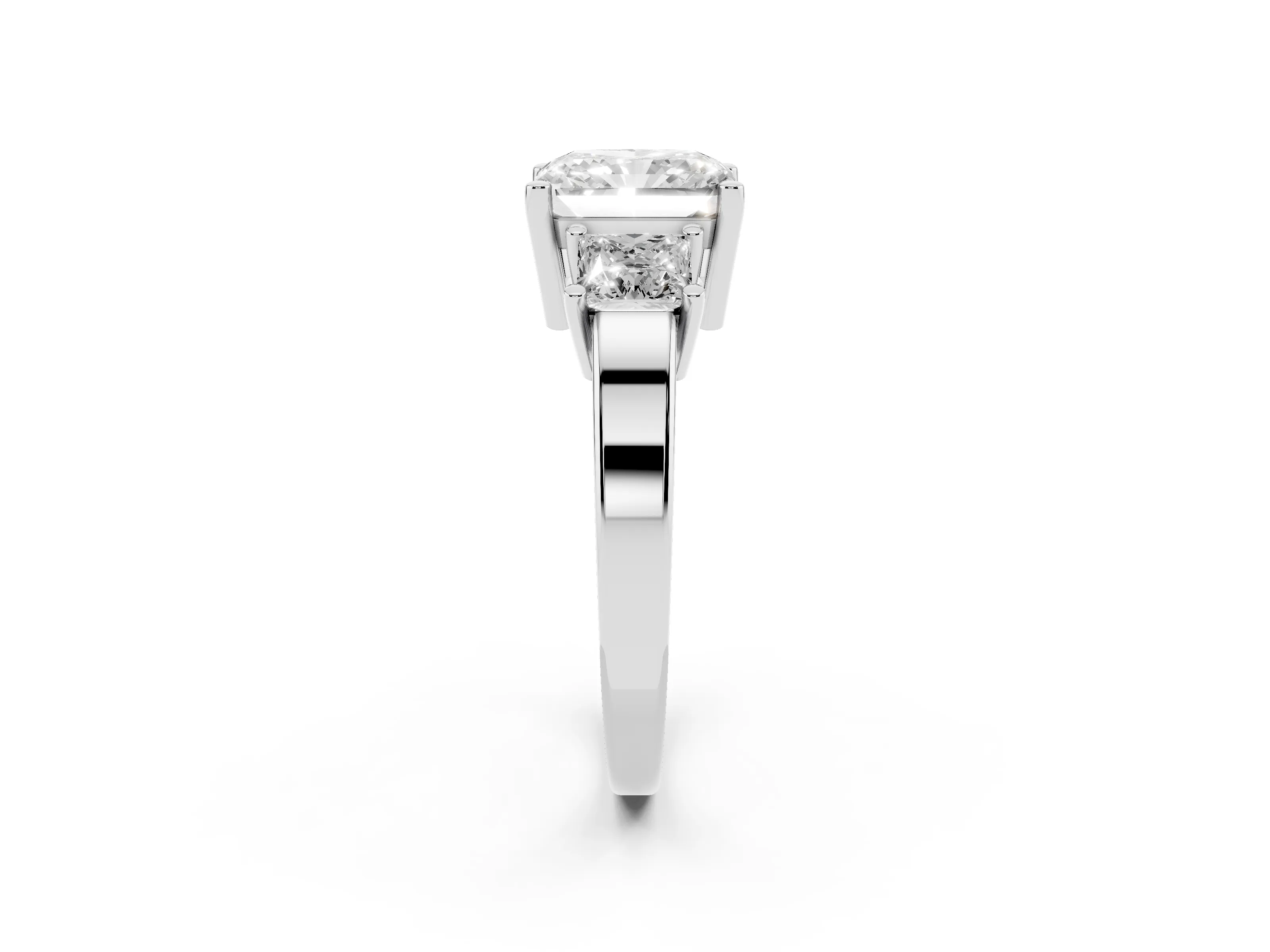 Three-Stone Radiant Cut Diamond Solitaire Ring Set in Platinum with Prong Setting