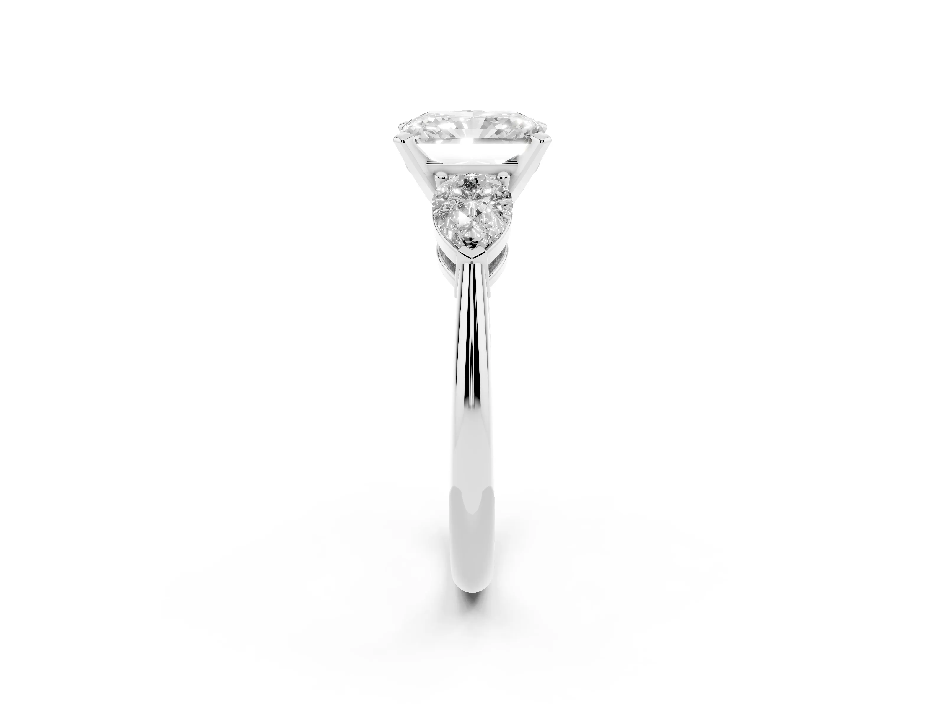 Three-Stone Radiant Cut Diamond Ring Set in Silver with Pear Side Stones and Prong Setting