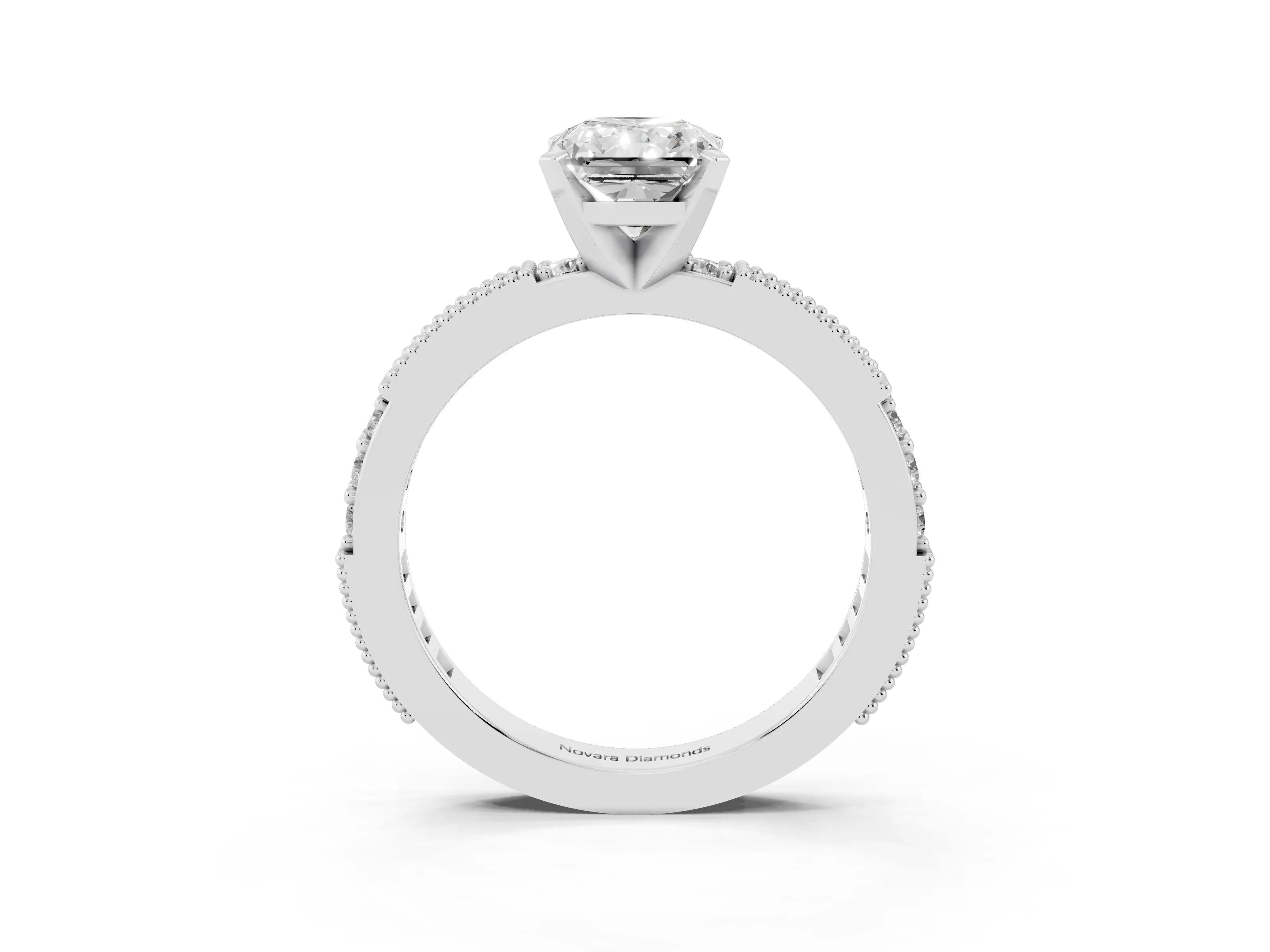 Radiant Cut Diamond Solitaire Ring Set in White gold with Slim Pavé Band and Prong Setting