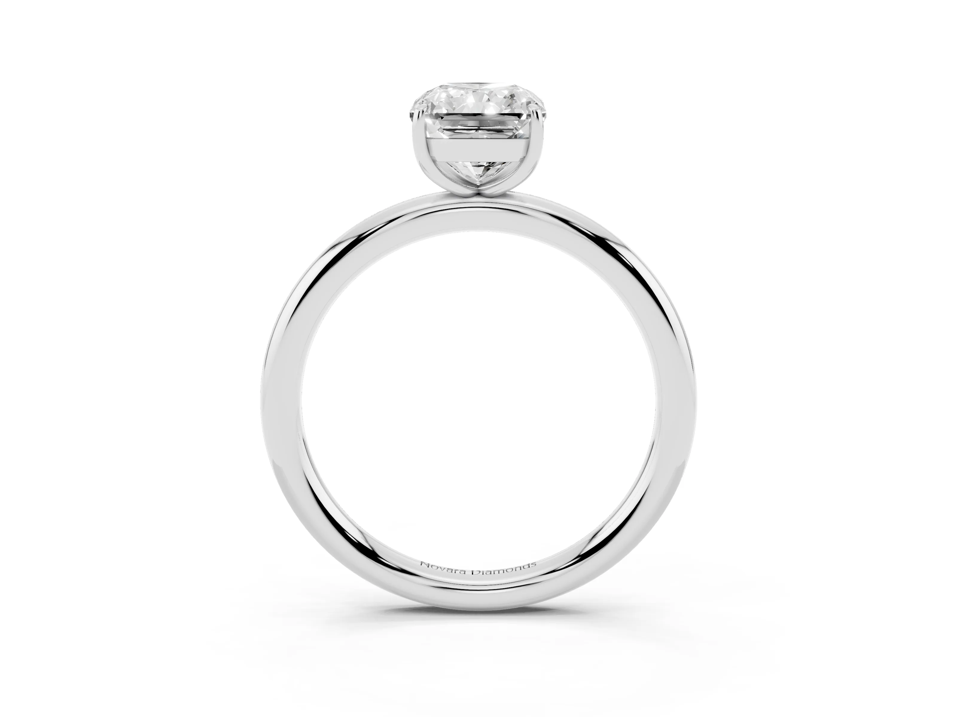 Radiant Cut Diamond Solitaire Ring Set in Silver with Prong Setting on a Polished Plain Band