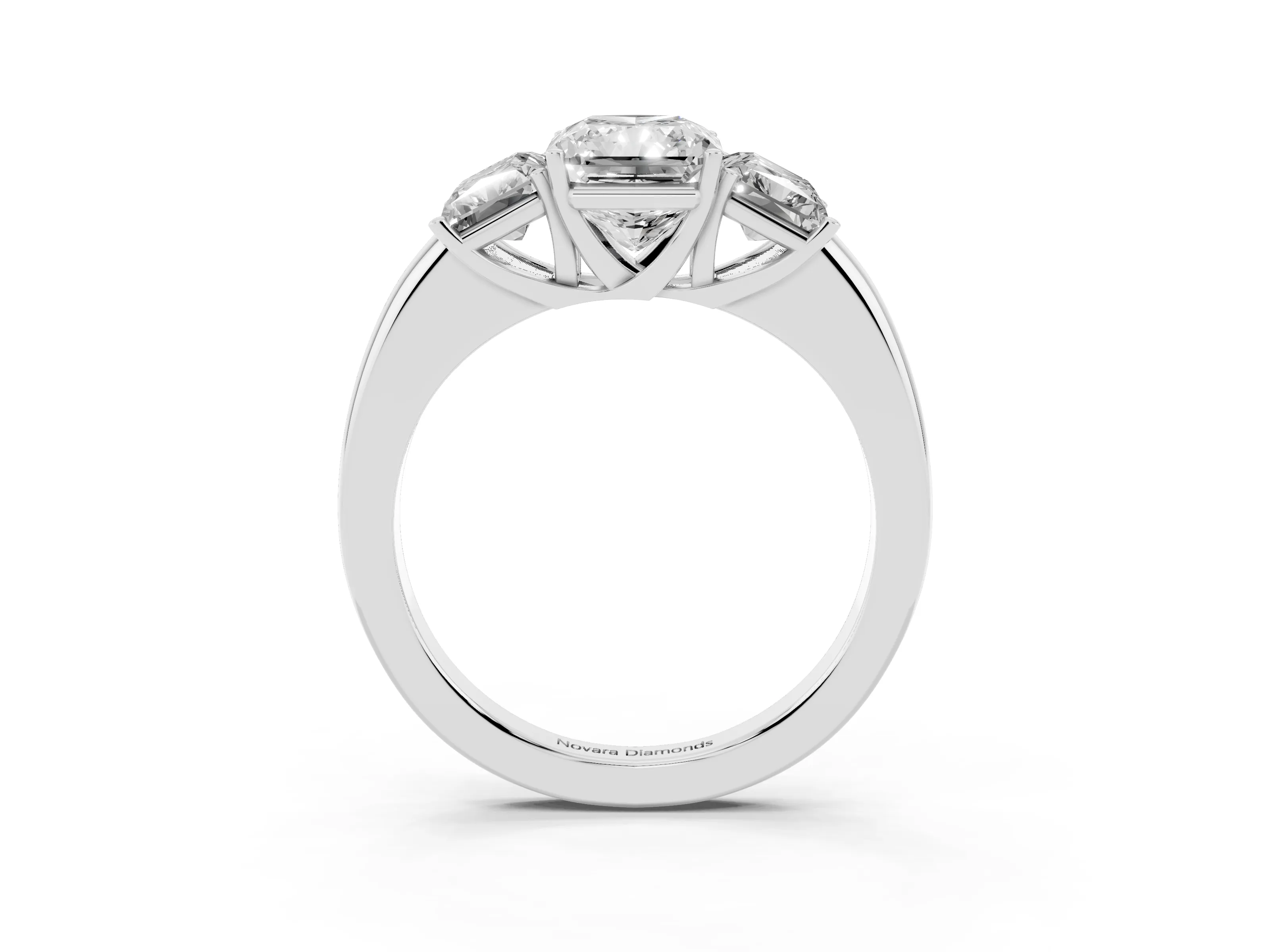 Radiant Cut Diamond Three-Stone Ring Set in Platinum with Bold Center and Classic Band