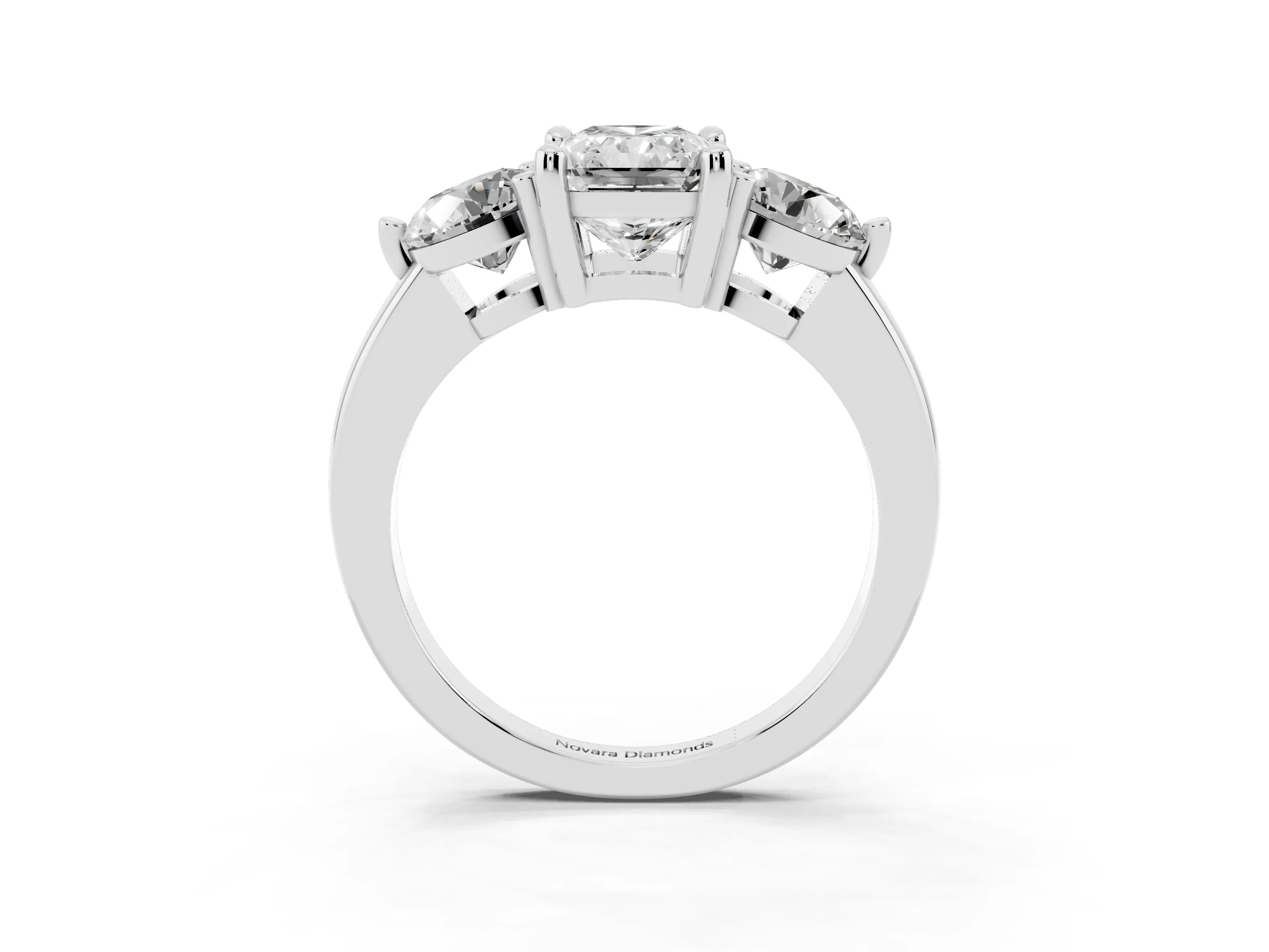 Radiant Cut Diamond Three-Stone Ring Set in White gold with Prong Setting and Classic Band