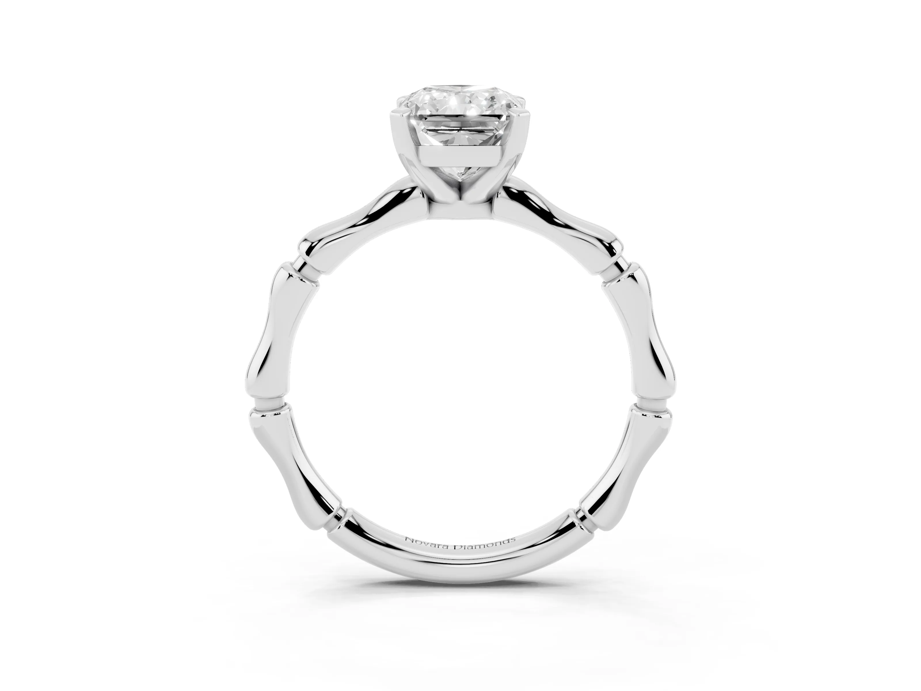 Radiant Cut Diamond Solitaire Ring Set in Platinum with Bamboo Band and Prong Setting