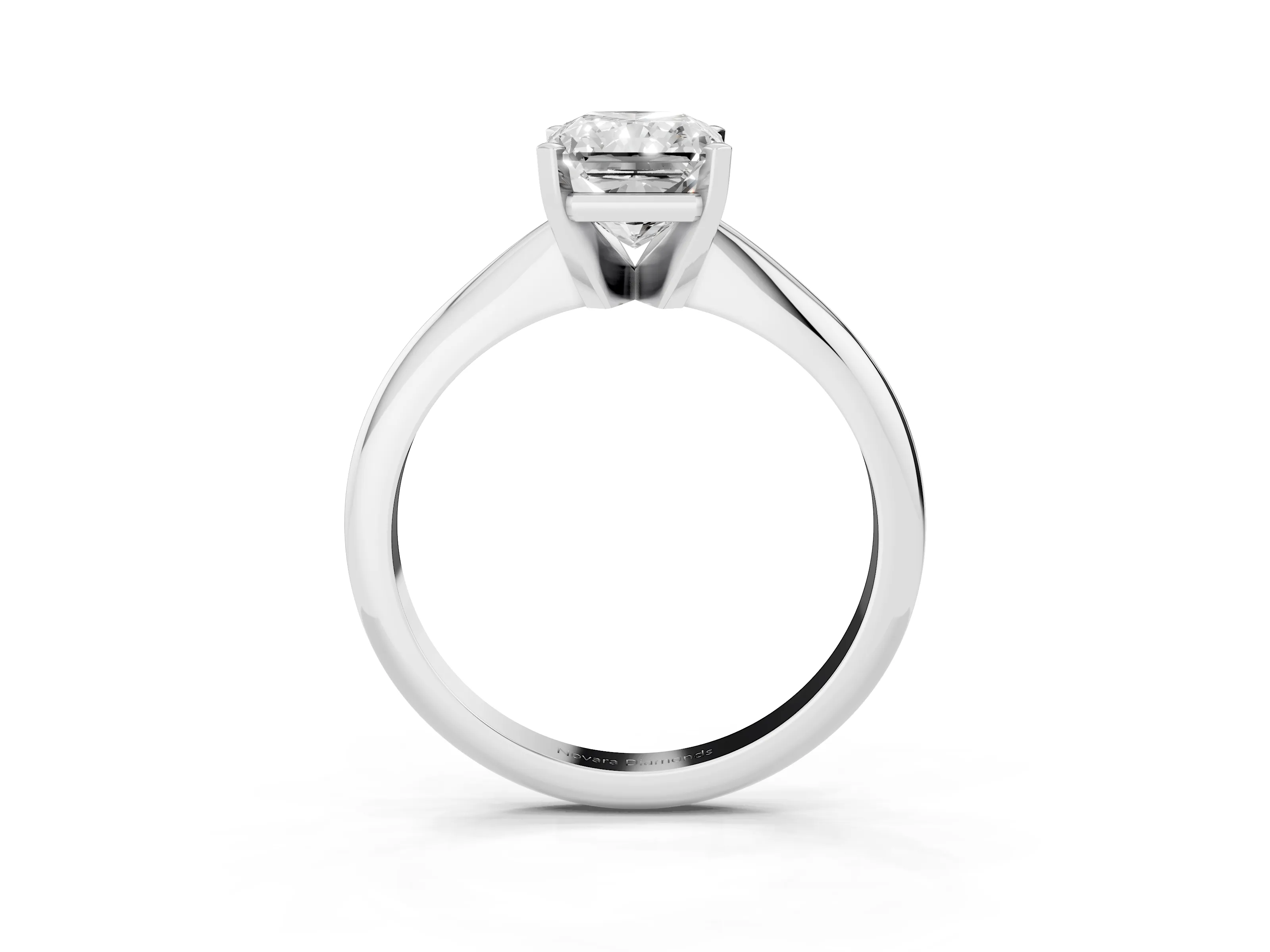 Radiant Cut Diamond Solitaire Ring Set in Platinum with Prong Setting on a Plain Round Band