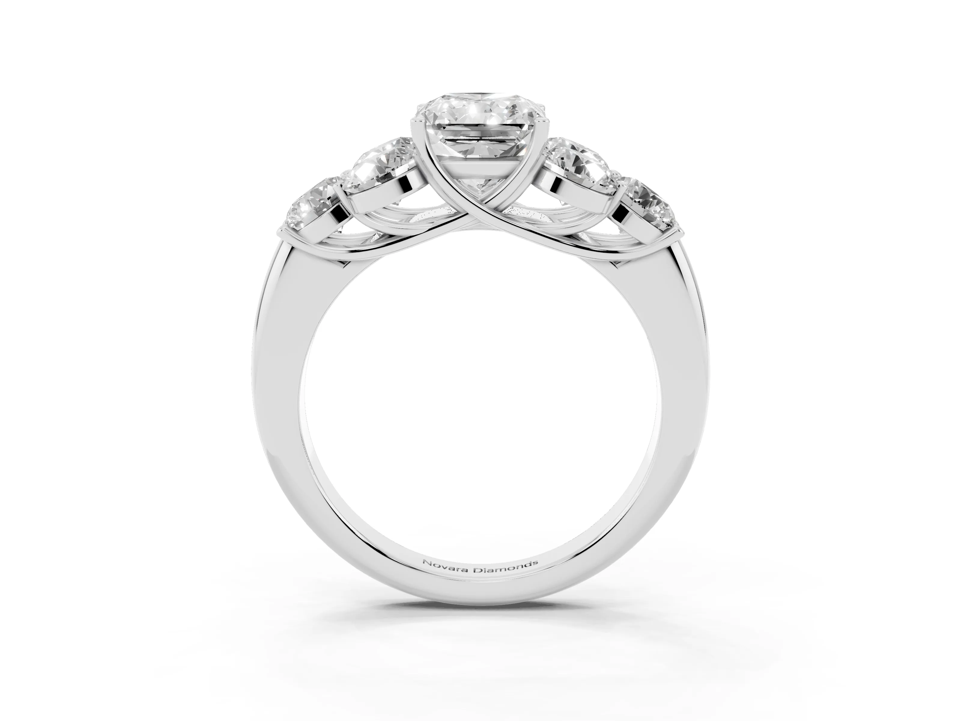 Radiant Cut Diamond Cluster Ring Set in Silver with Round Accent Stones and Prong Setting on a Plain Band