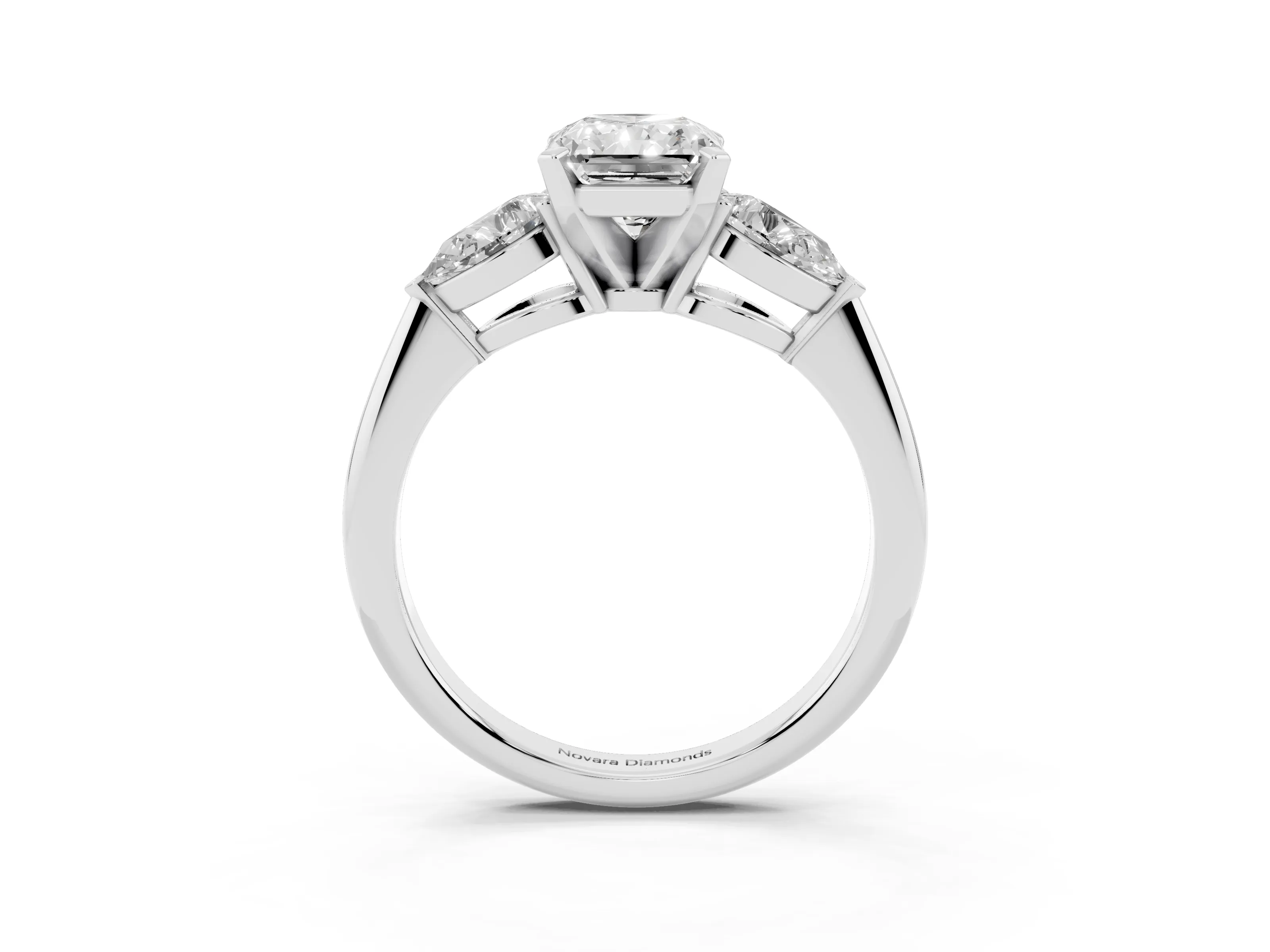 Three-Stone Radiant Cut Diamond Ring Set in Silver with Pear Side Stones and Prong Setting