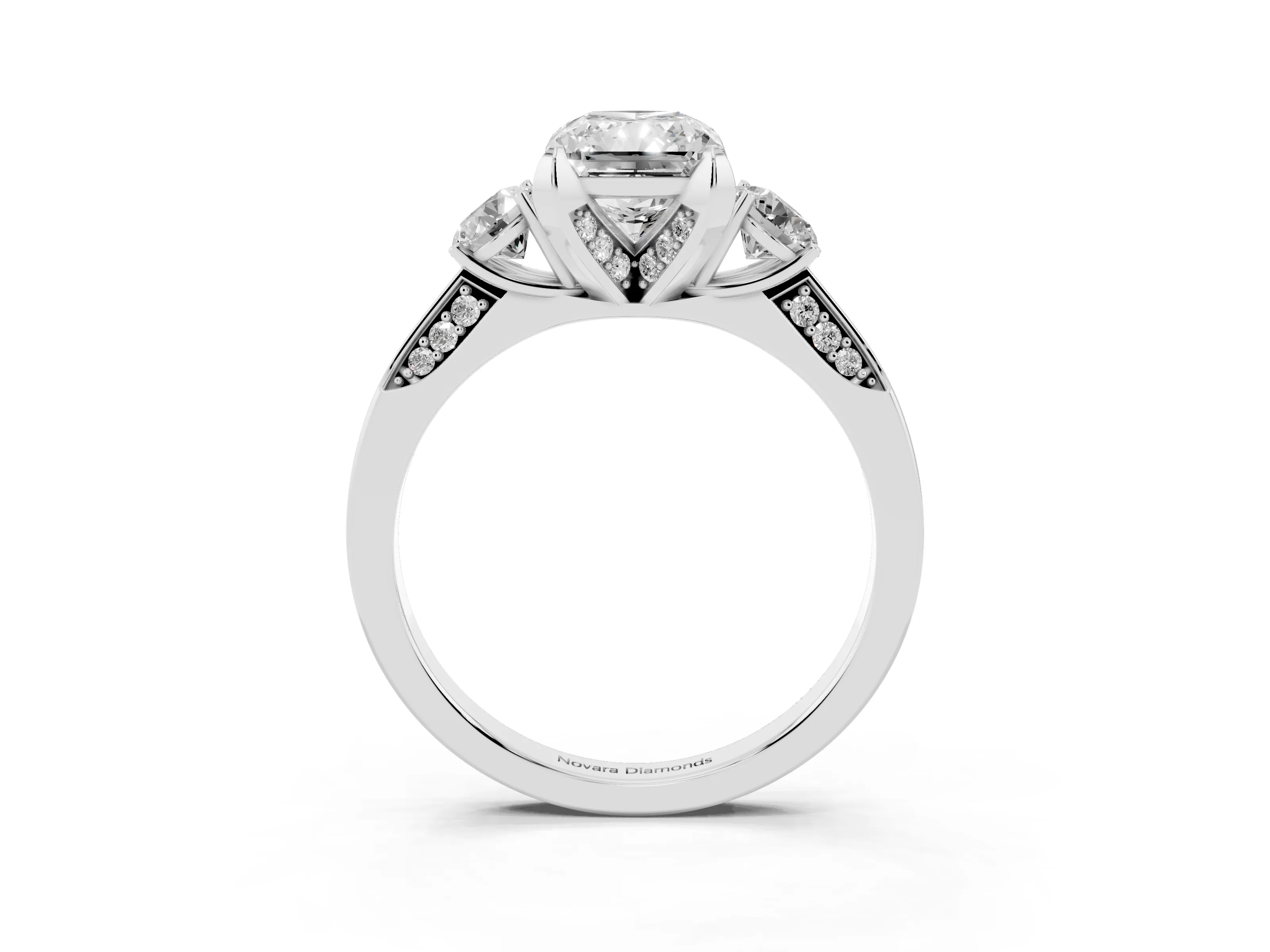 Radiant Cut Diamond Three-Stone Ring Set in Platinum with Pavé Band and Smaller Side Stones