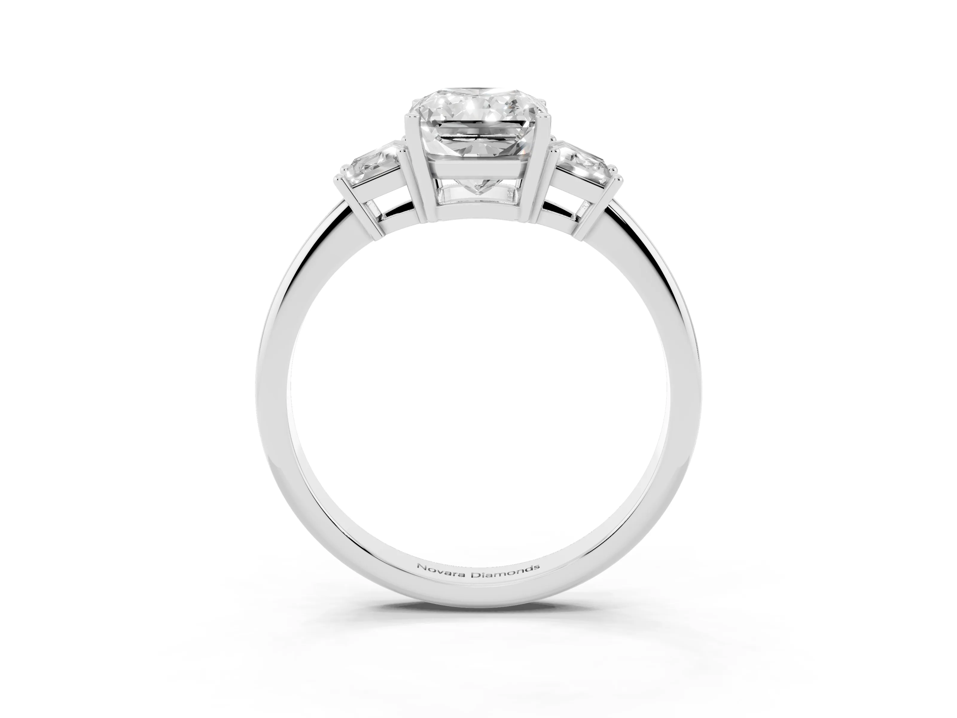 Radiant Cut Diamond Three-Stone Ring Set in Platinum with Trapezoid Side Stones and Prong Setting