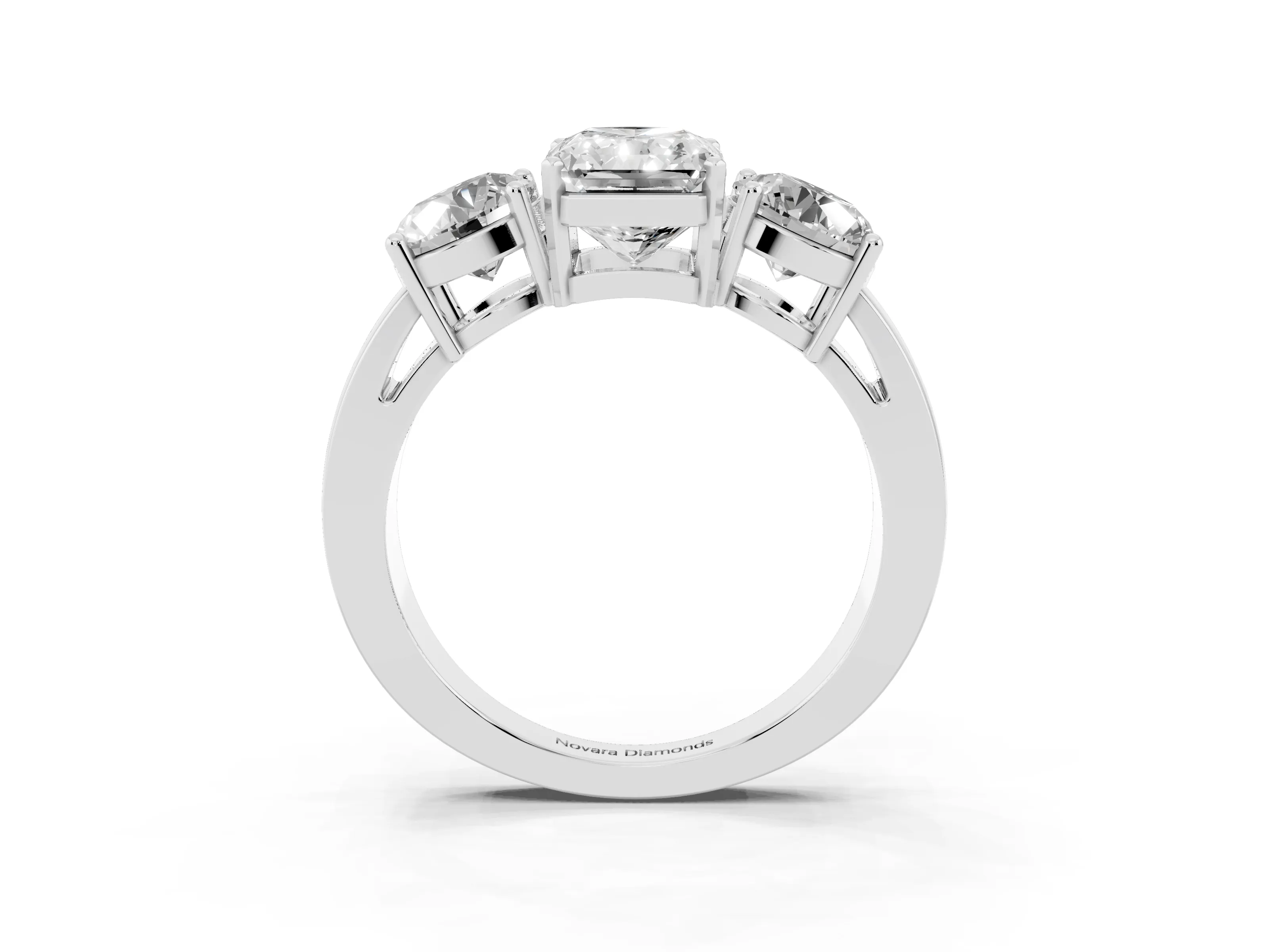 Radiant Cut Diamond Three-Stone Ring Set in Platinum with Round Side Stones and Classic Band