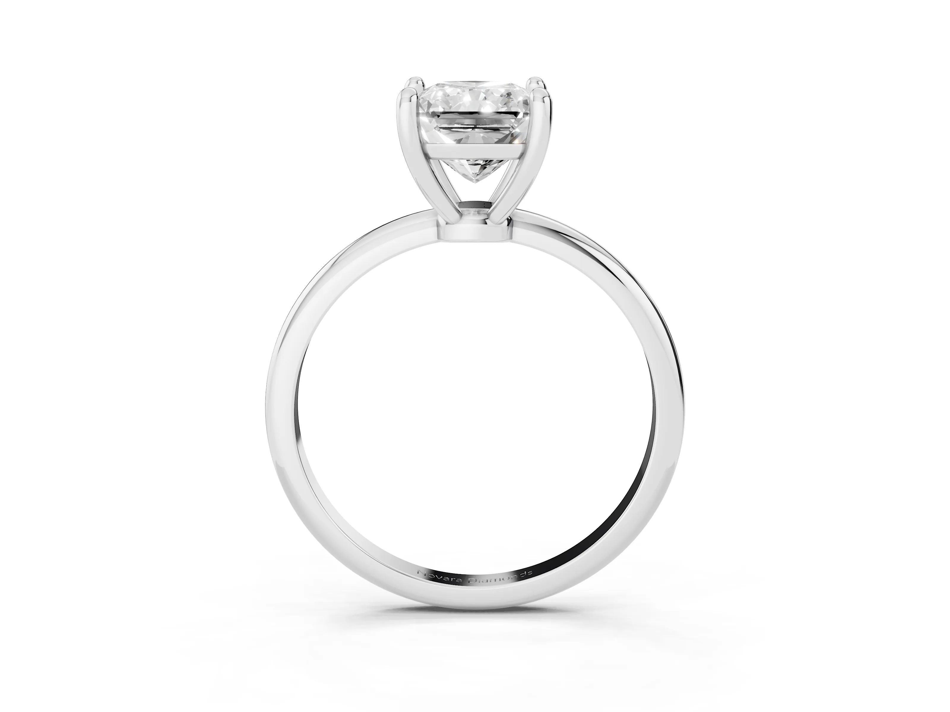 Radiant Cut Diamond Solitaire Ring Set in White gold with Secure Prong Setting on a Classic Band
