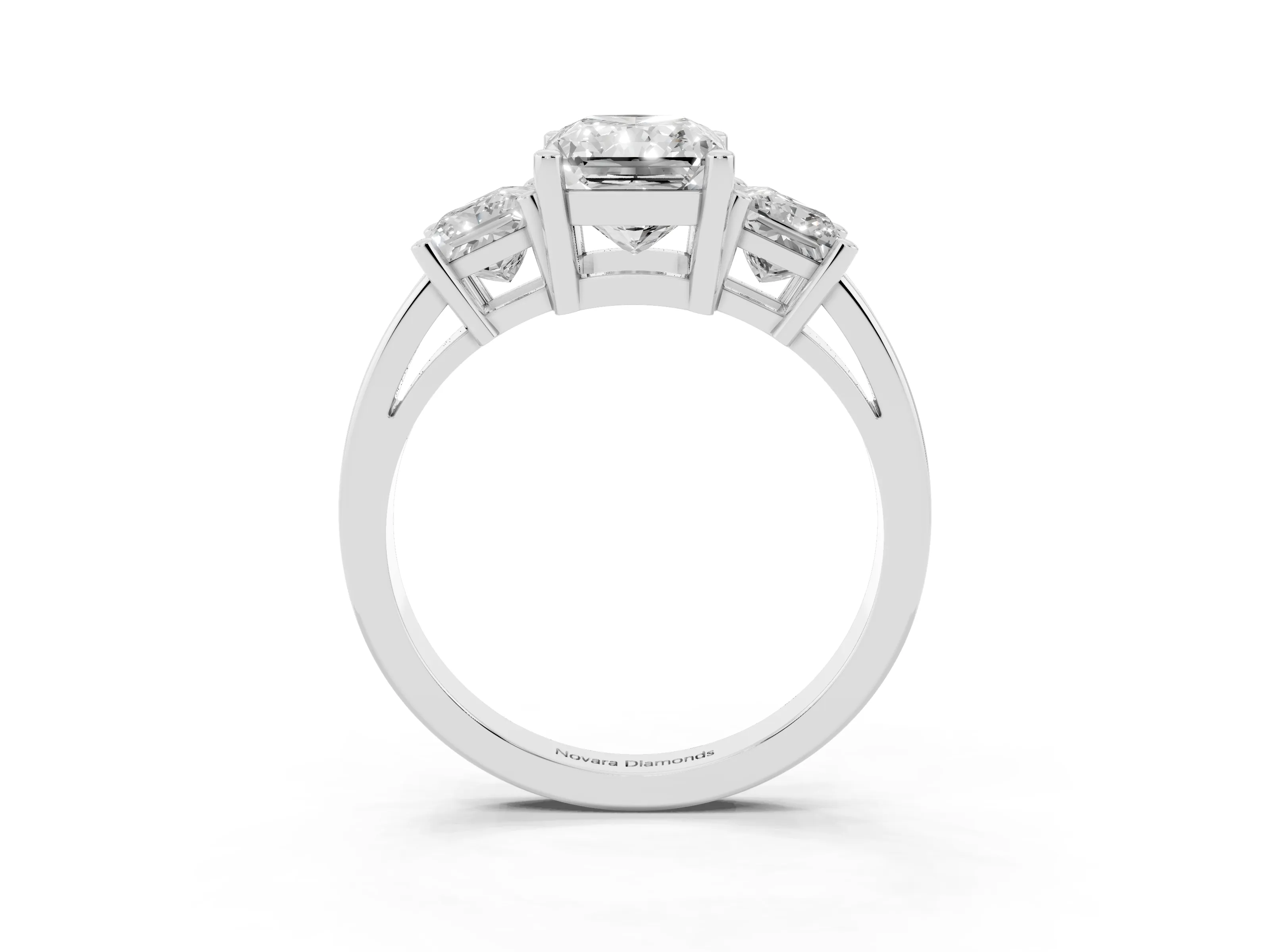 Three-Stone Radiant Cut Diamond Solitaire Ring Set in Platinum with Prong Setting