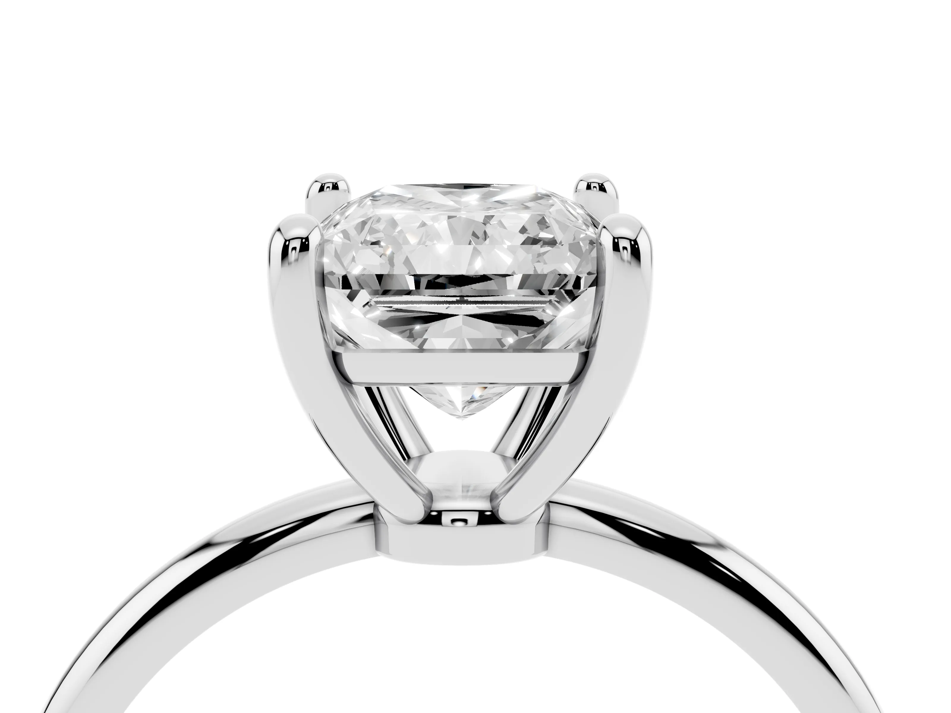 Radiant Cut Diamond Solitaire Ring Set in White gold with Secure Prong Setting on a Classic Band