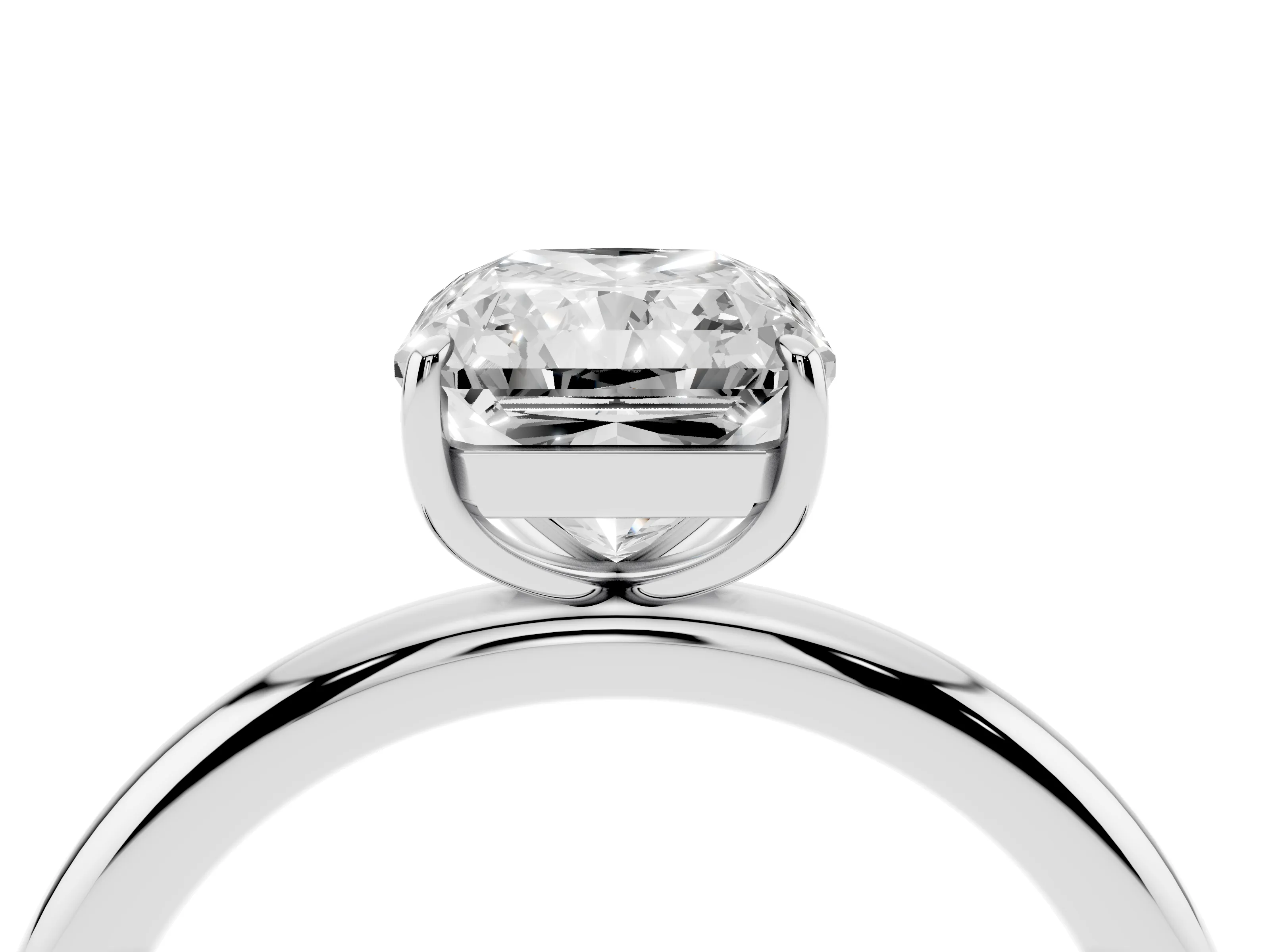 Radiant Cut Diamond Solitaire Ring Set in Silver with Prong Setting on a Polished Plain Band