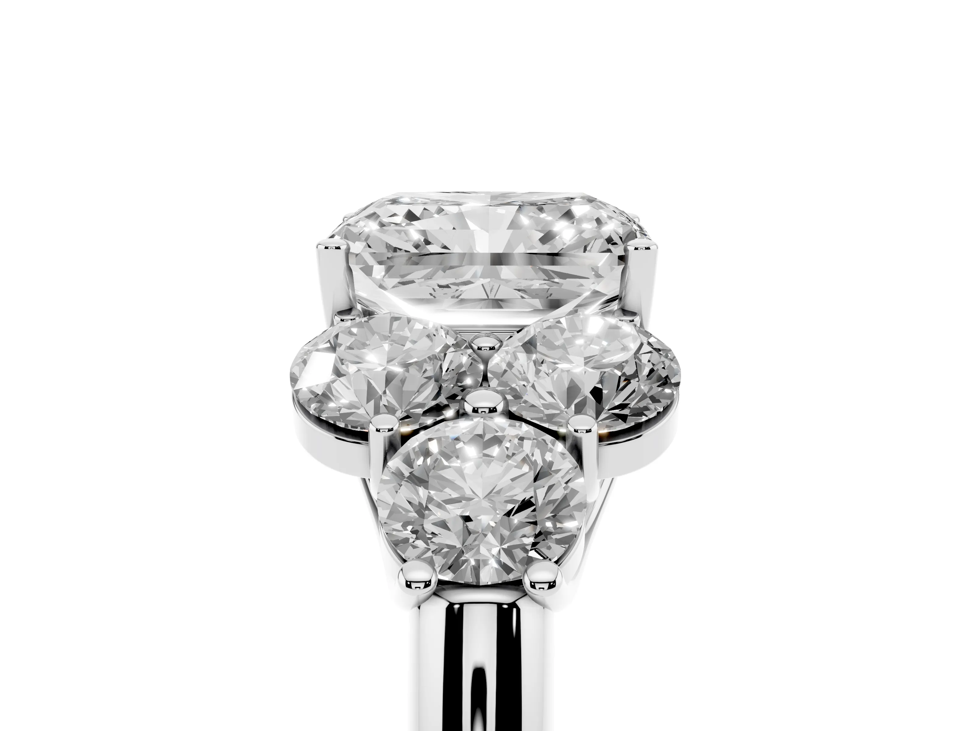 Radiant Cut Diamond Cluster Ring Set in Silver with Round Accent Stones and Prong Setting on a Plain Band