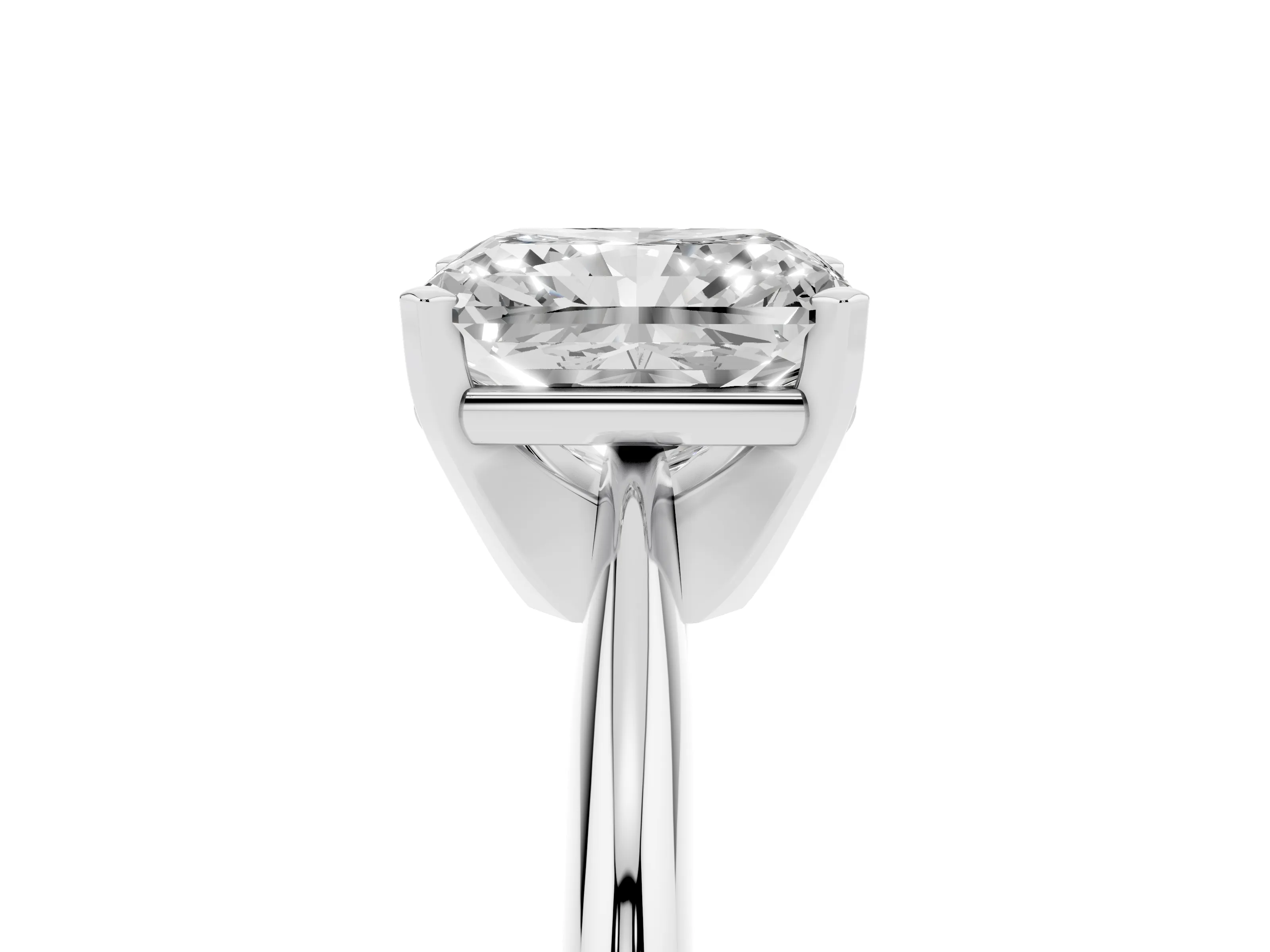 Radiant Cut Diamond Solitaire Ring Set in Platinum with Prong Setting on a Plain Round Band