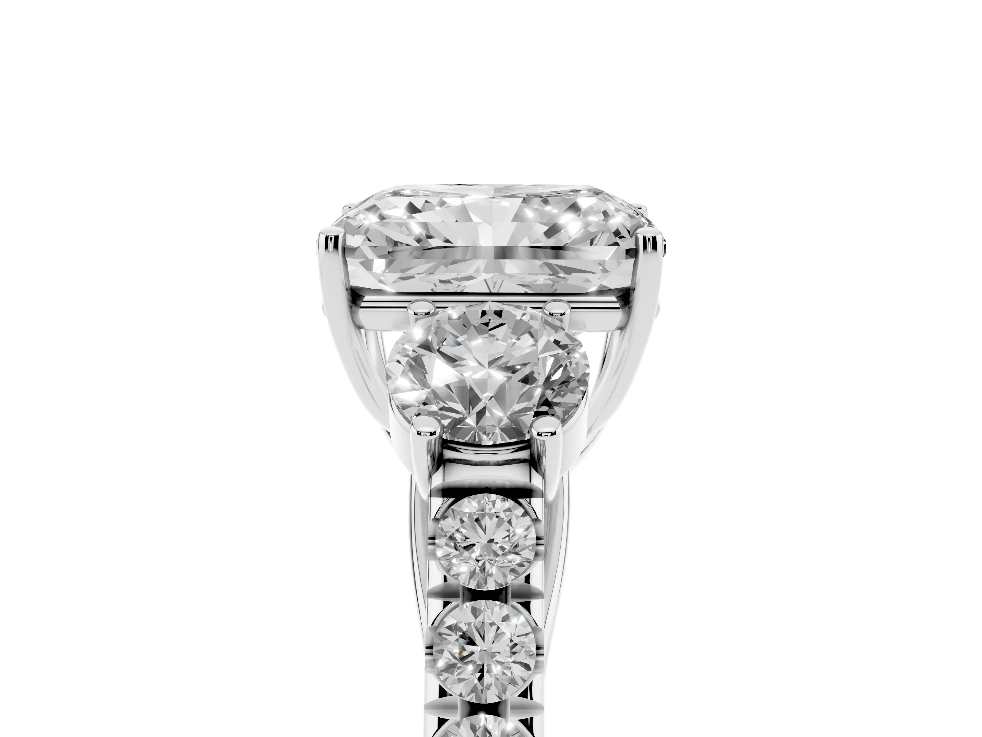 Radiant Cut Diamond Three-Stone Ring Set in Platinum with Round Side Stones and Delicate Pavé Band