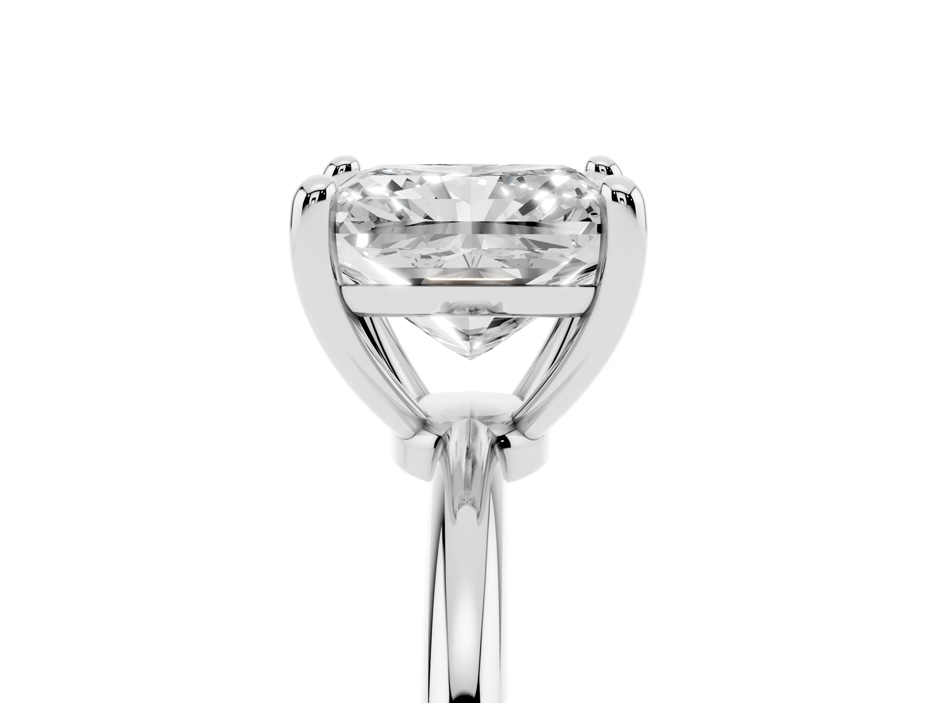 Radiant Cut Diamond Solitaire Ring Set in White gold with Secure Prong Setting on a Classic Band