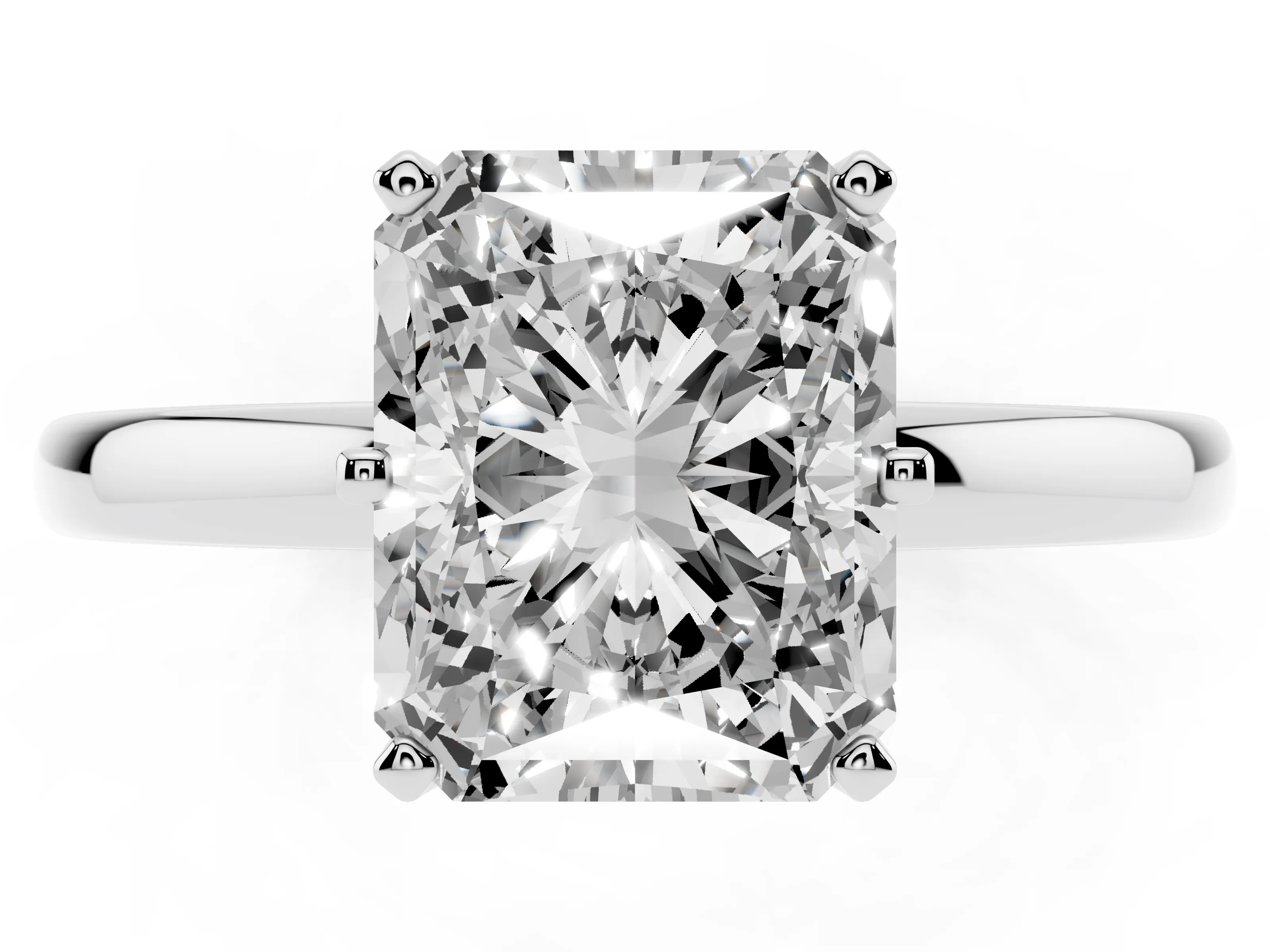 Radiant Cut Diamond Solitaire Ring Set in Silver with Raised Prong Setting on a Classic Band