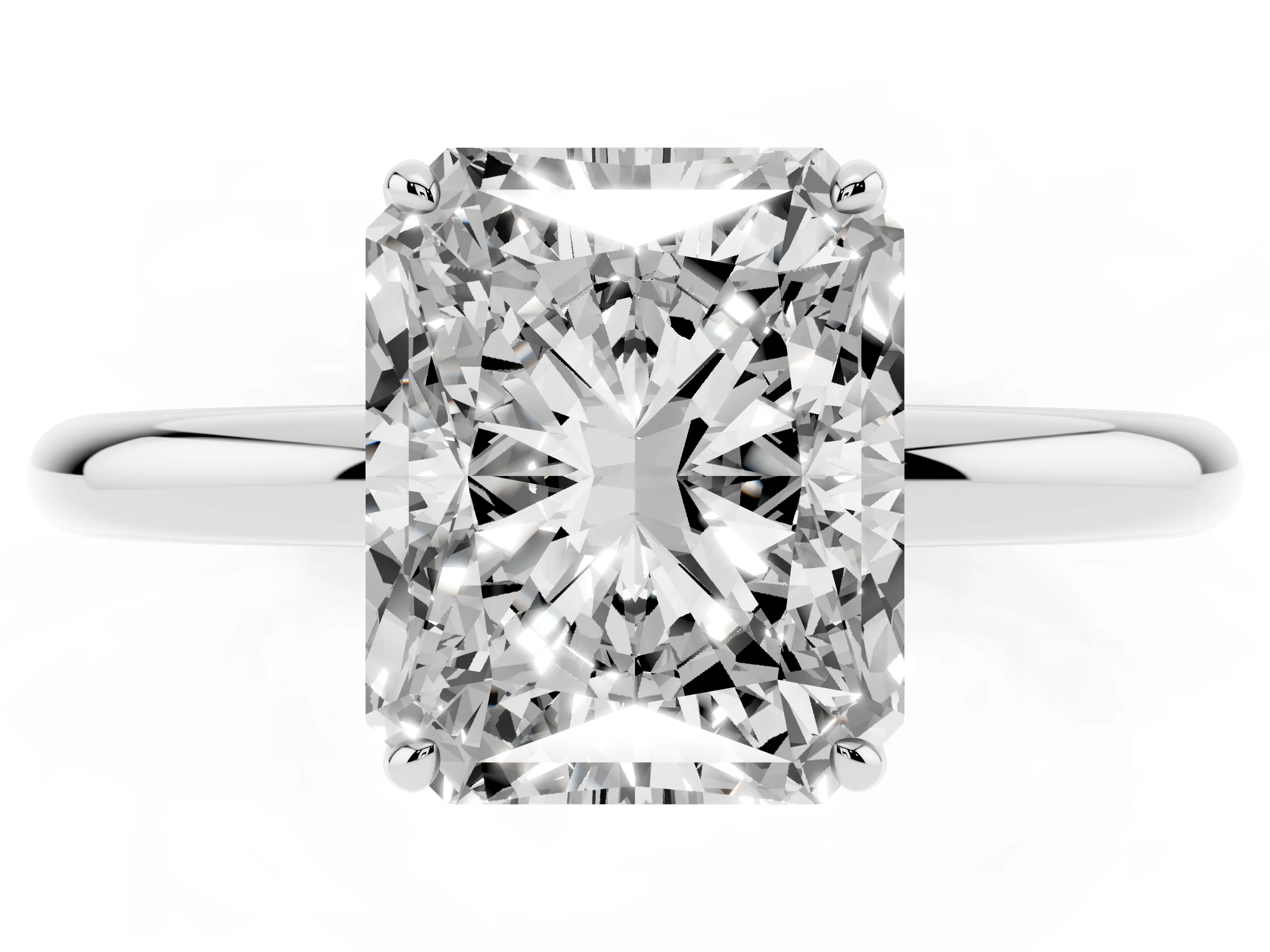 Radiant Cut Diamond Solitaire Ring Set in Silver with Prong Setting on a Polished Plain Band