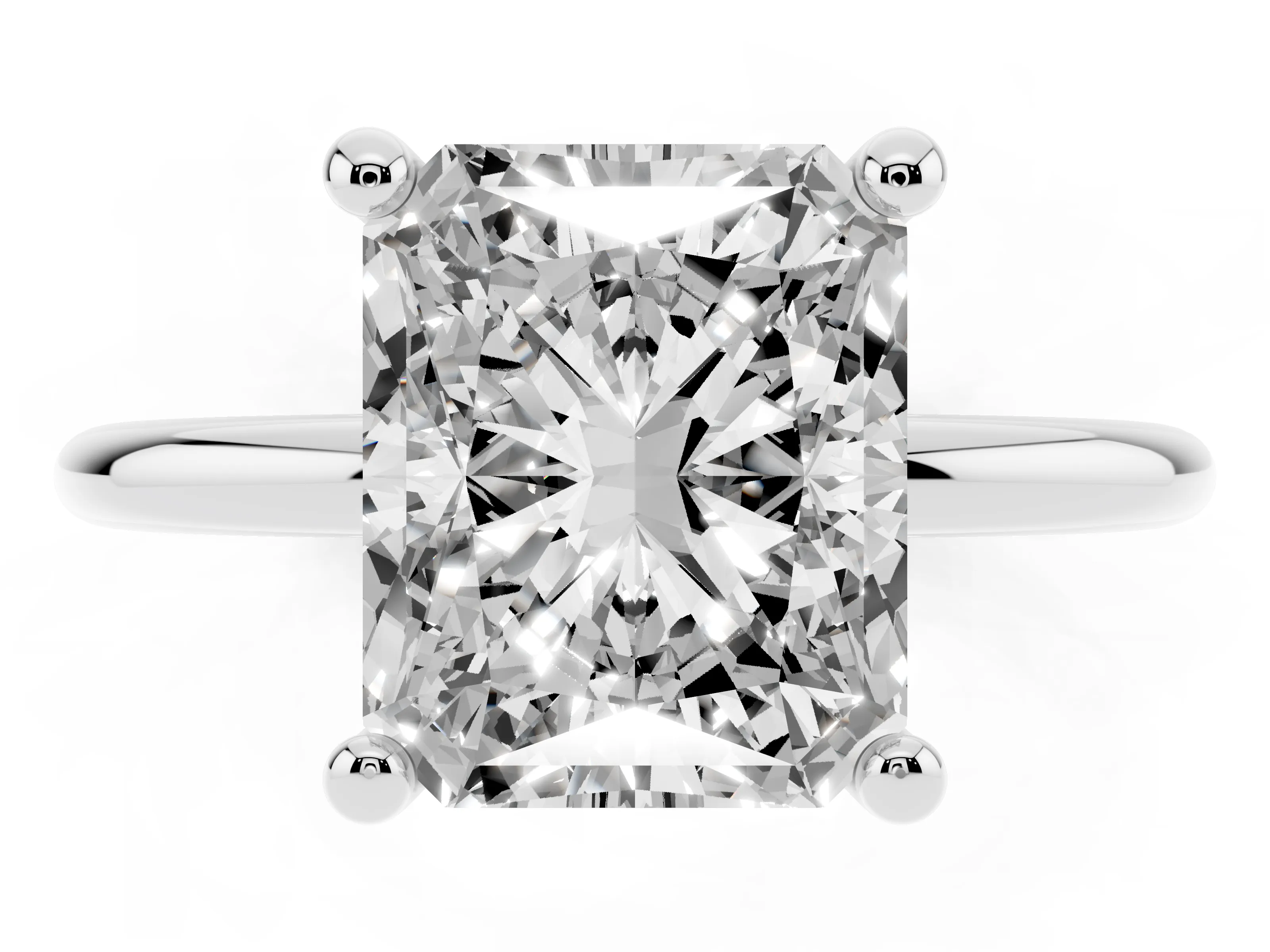 Radiant Cut Diamond Solitaire Ring Set in White gold with Secure Prong Setting on a Classic Band