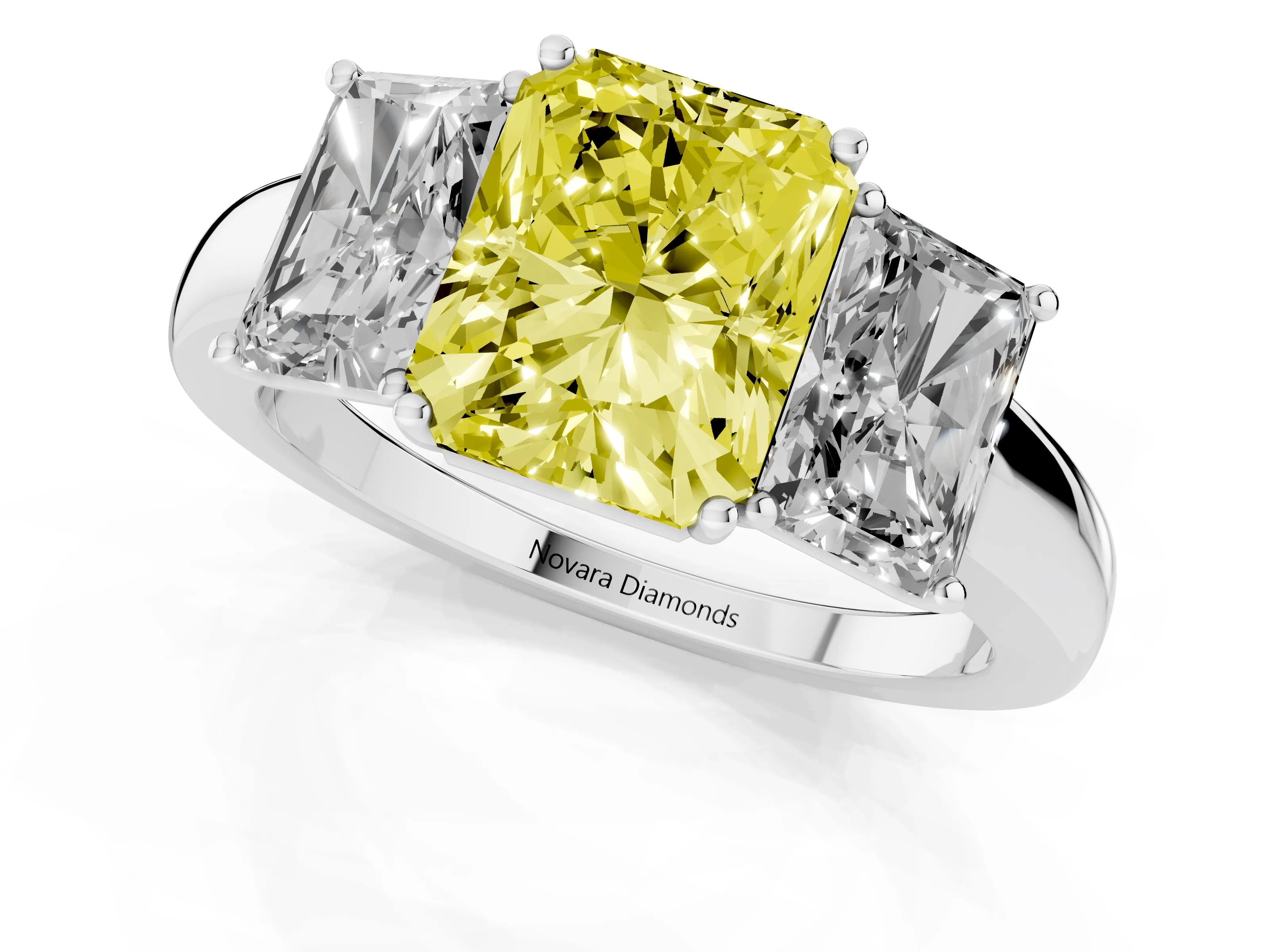 Fancy Yellow Radiant Cut Diamond Three-Stone Ring Set in White gold with Bold Center and Classic Band