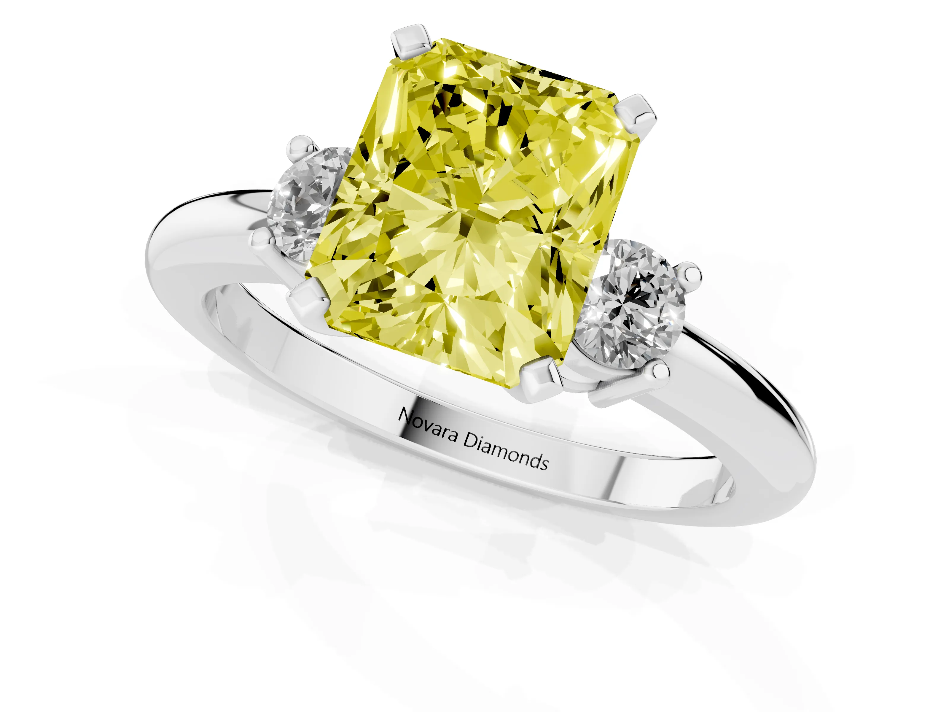 Fancy Yellow Three-Stone Radiant Cut Diamond Ring Set in White gold with Prong Setting and Plain Band