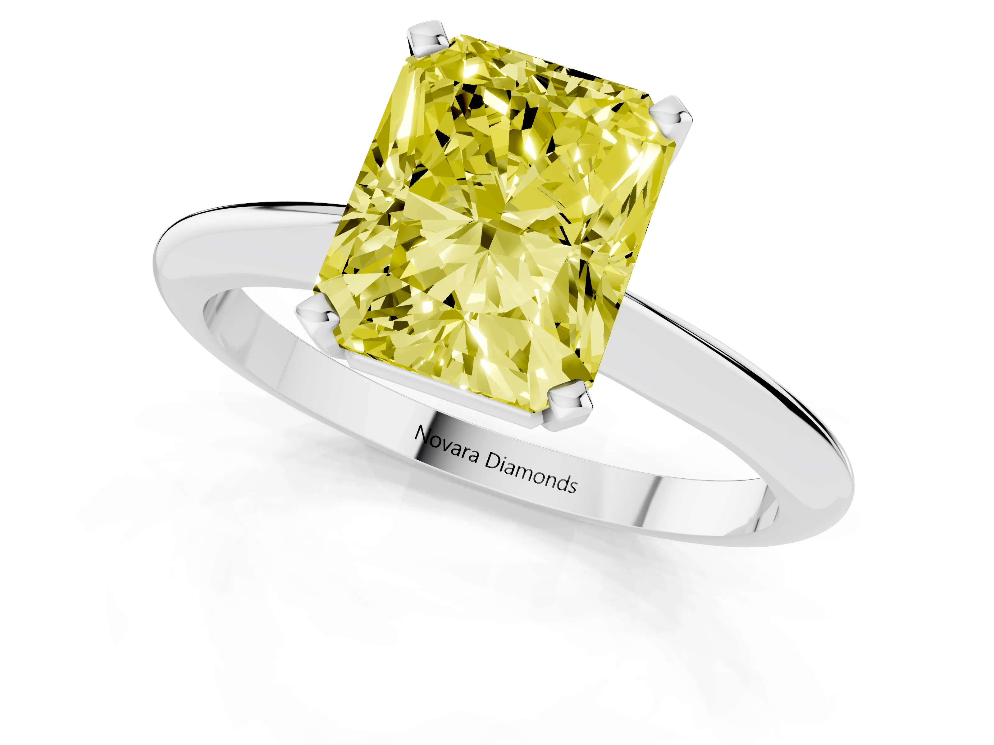 Fancy Yellow Radiant Cut Diamond Solitaire Ring Set in White gold with Prong Setting on a Plain Round Band