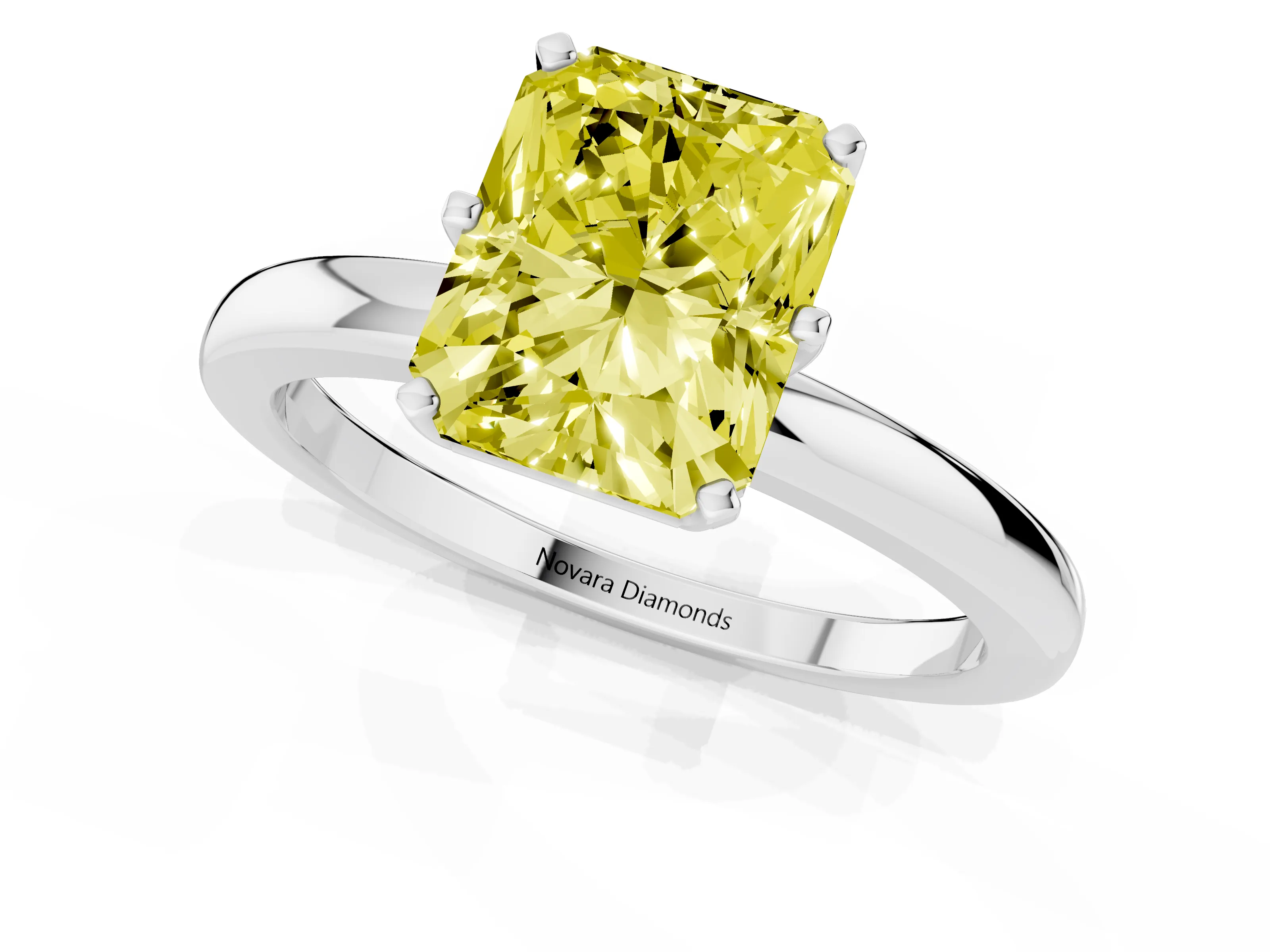 Fancy Yellow Radiant Cut Diamond Solitaire Ring Set in Silver with Raised Prong Setting on a Classic Band