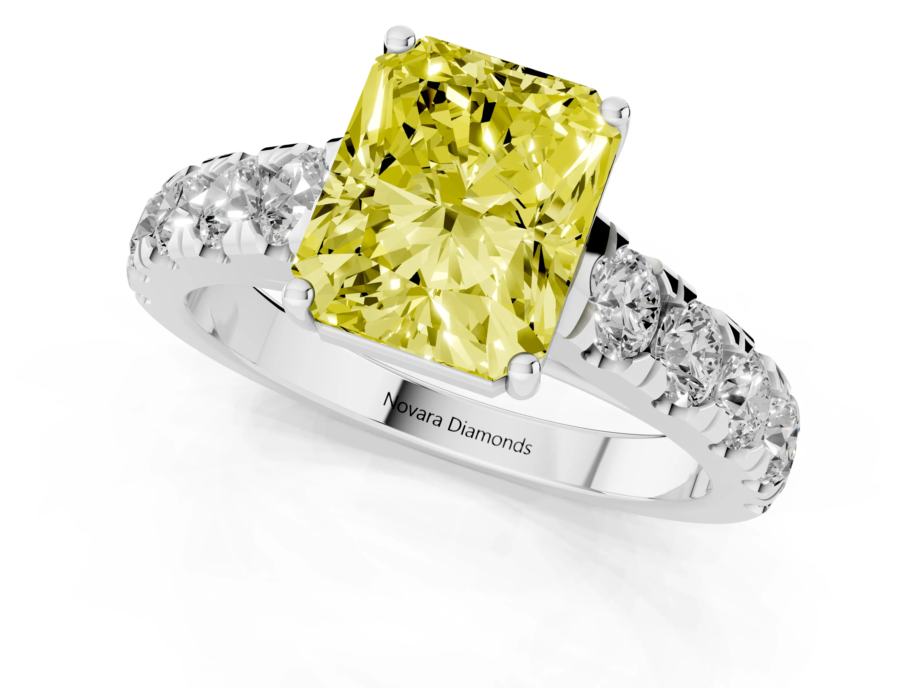 Fancy Yellow Radiant Cut Diamond Solitaire Ring Set in White gold with Cut-Down Micro Pavé Band and Prong Setting
