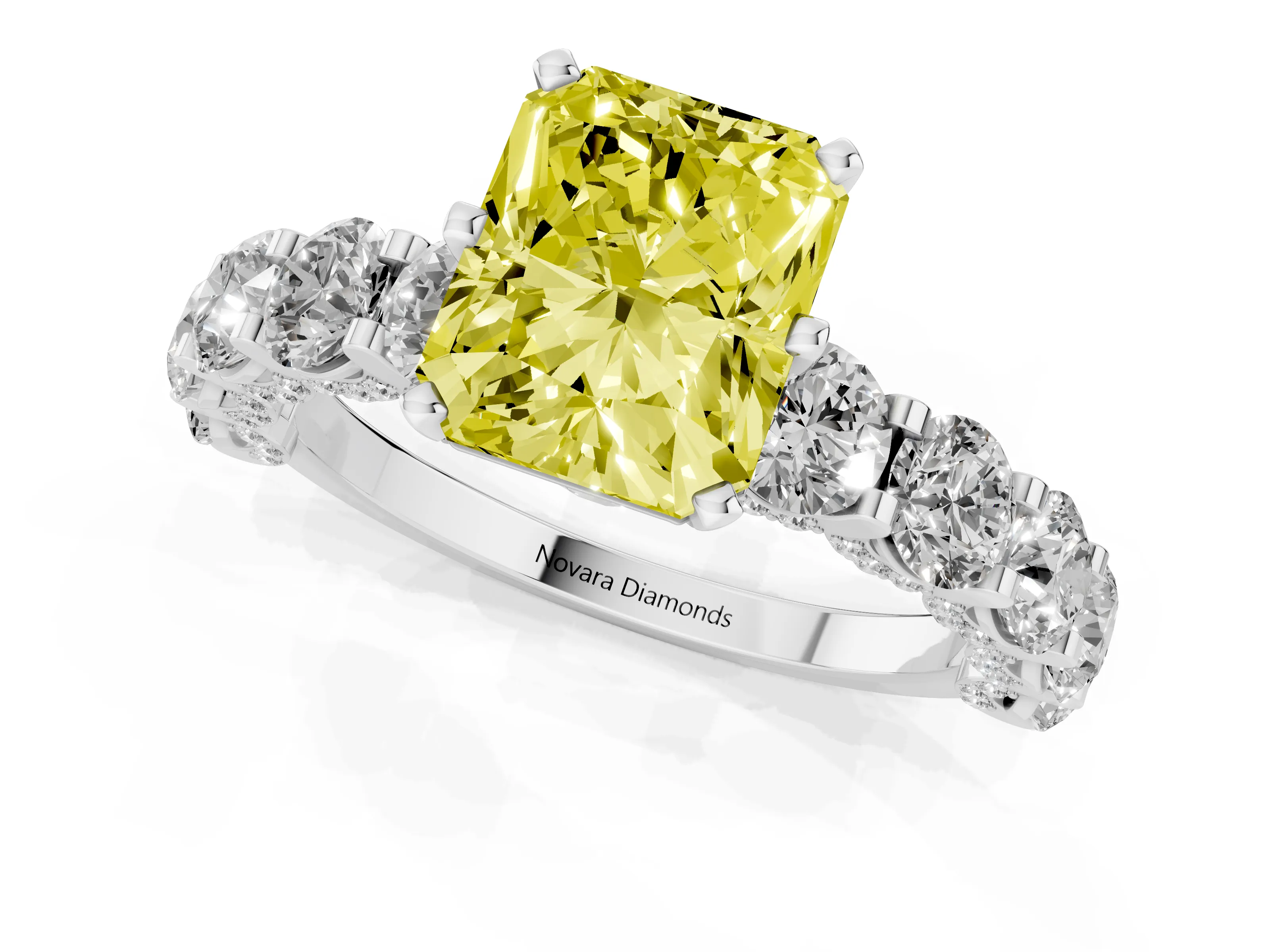 Fancy Yellow Radiant Cut Diamond Side Stone Ring Set in Platinum with Alternating Round and Oval Side Stones
