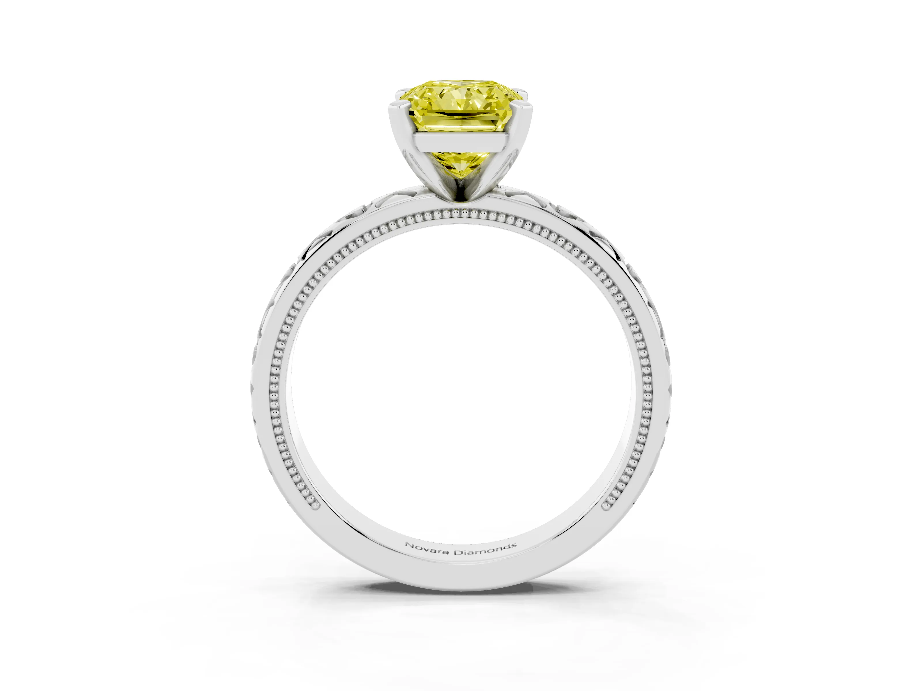 Fancy Yellow Radiant Cut Diamond Solitaire Engagement Ring Set in White gold with XO Engraved Band and Prong Setting