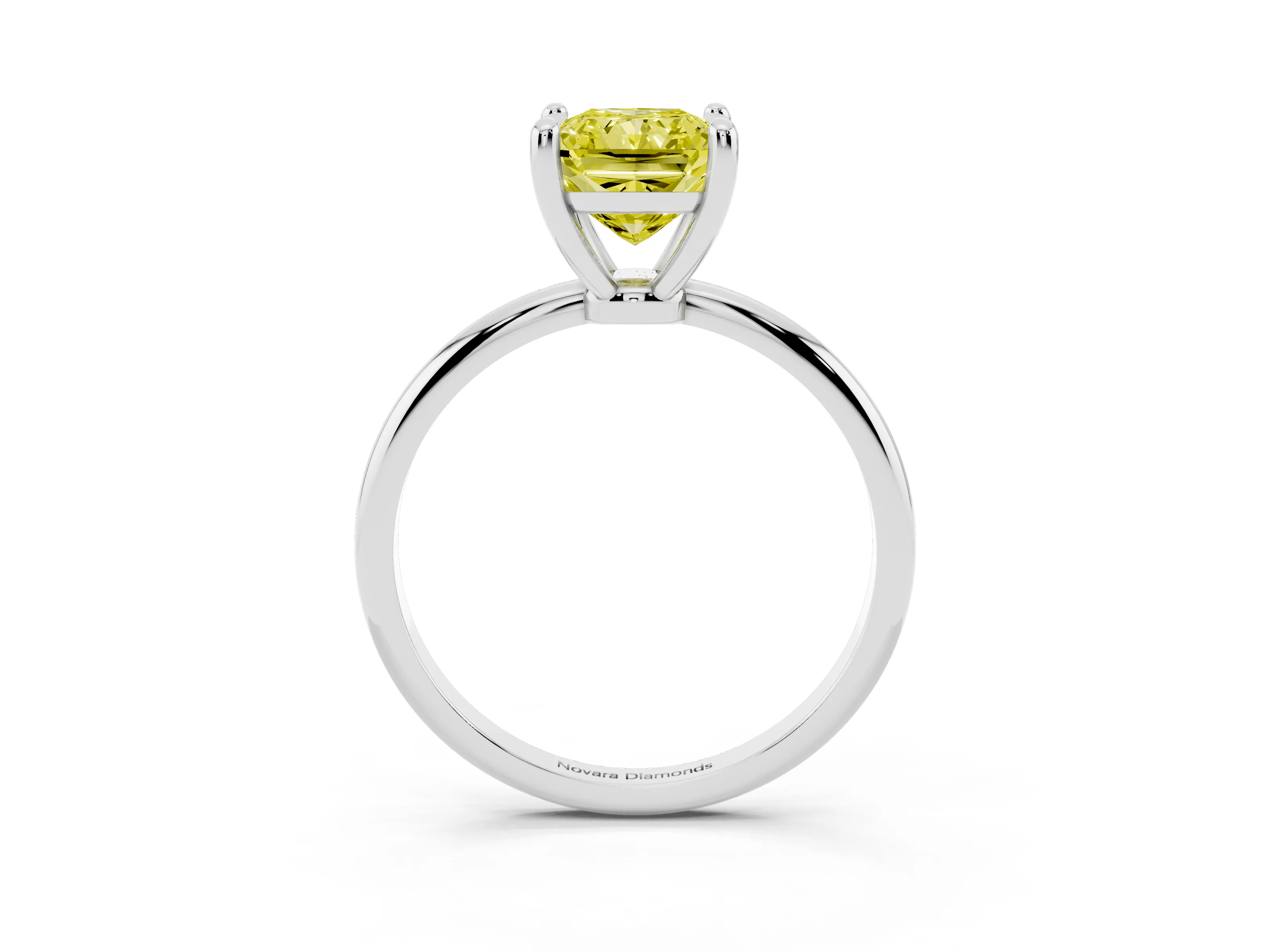 Fancy Yellow Radiant Cut Diamond Solitaire Ring Set in White gold with Secure Prong Setting on a Classic Band