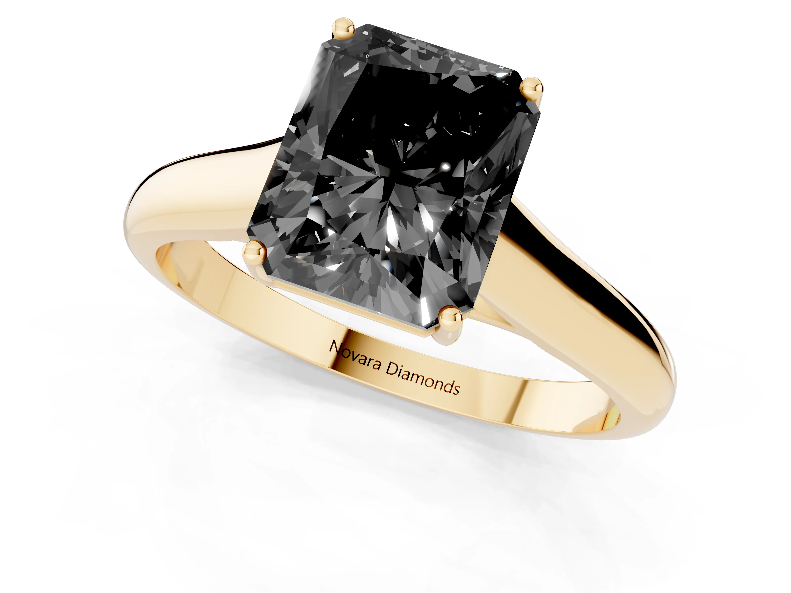 Fancy Black Radiant Cut Diamond Solitaire Engagement Ring Set in Yellow gold with Subtly Tapered Band and Prong Setting