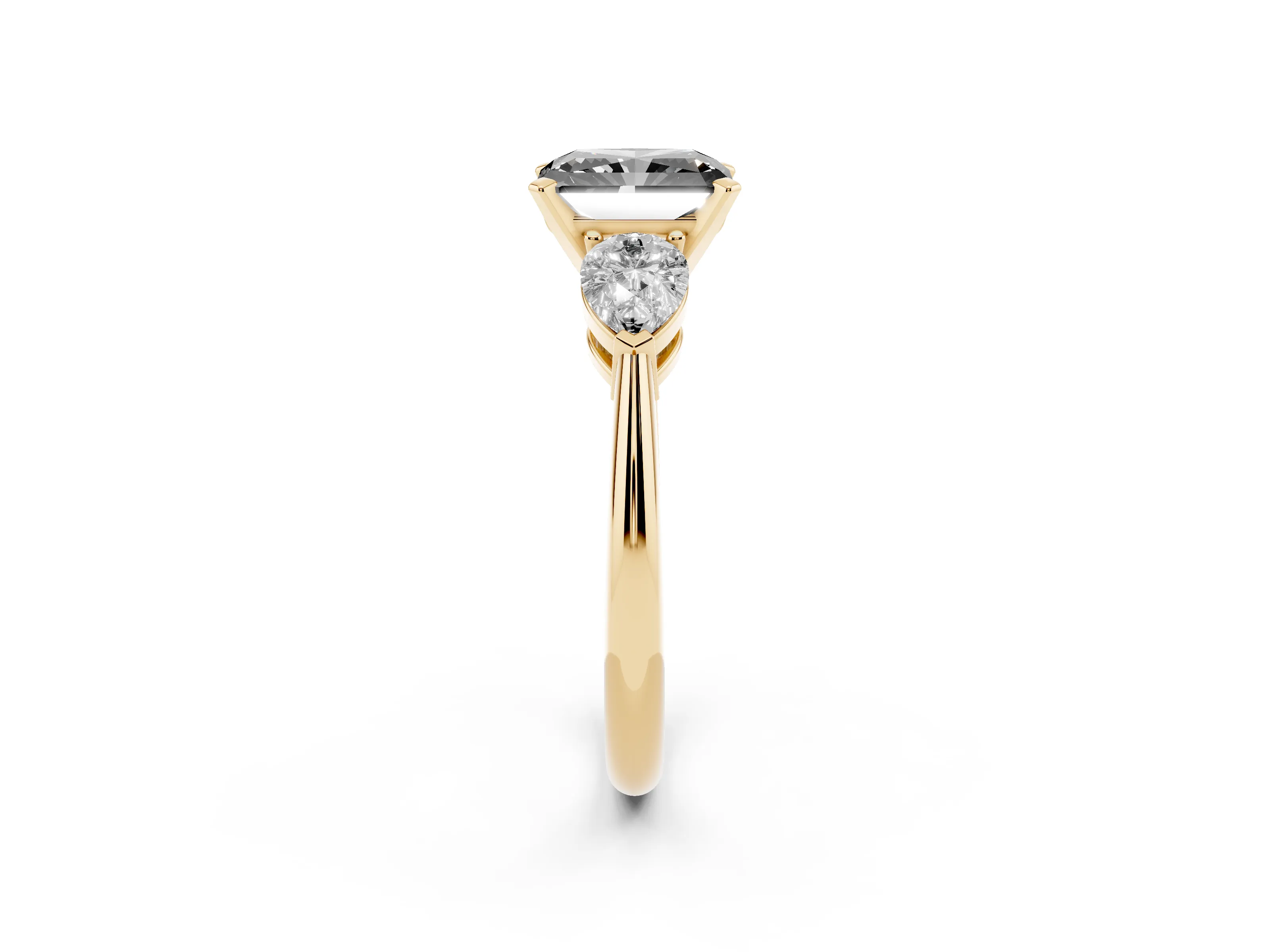 Fancy Black Three-Stone Radiant Cut Diamond Ring Set in Yellow gold with Pear Side Stones and Prong Setting
