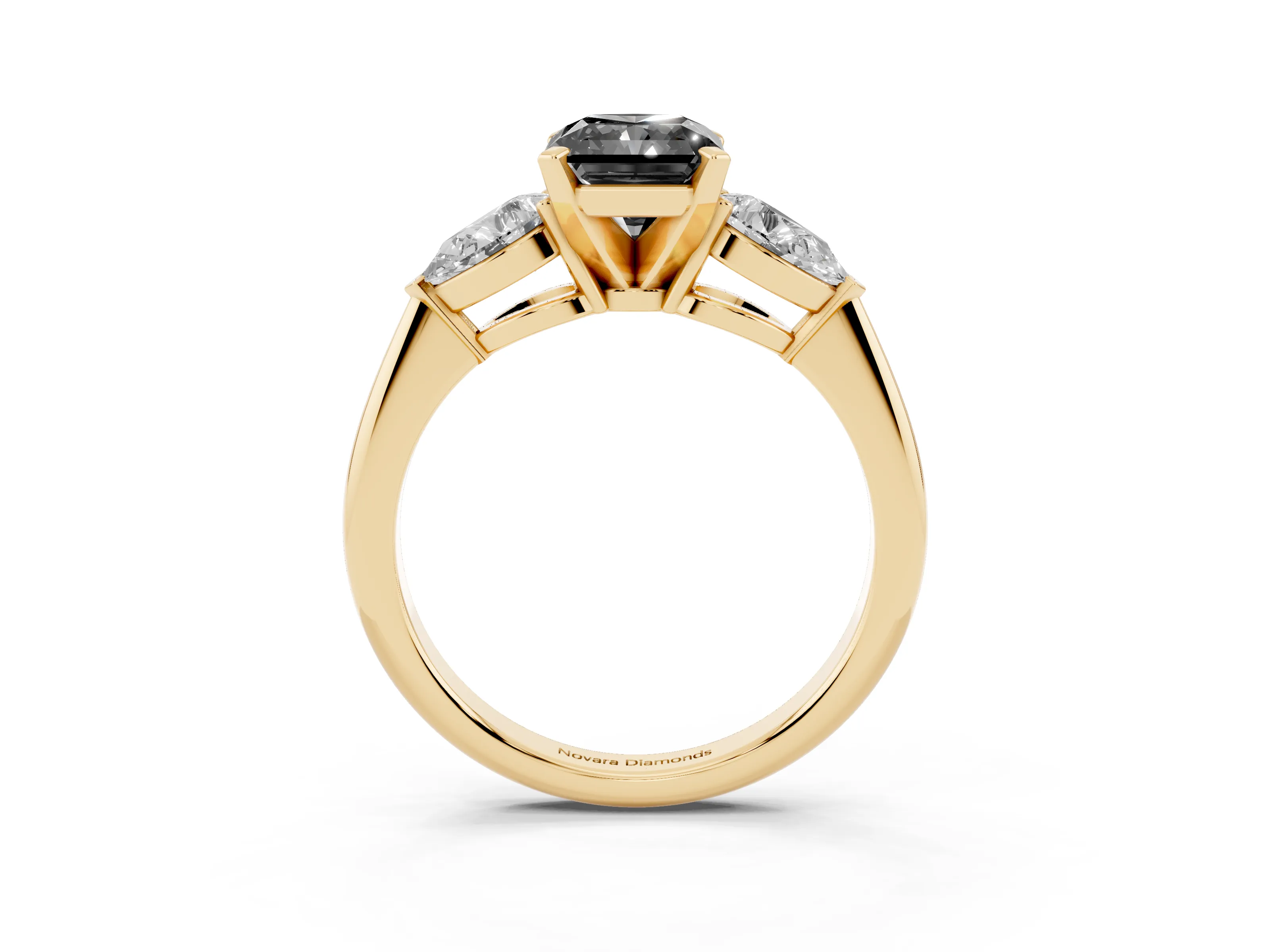 Fancy Black Three-Stone Radiant Cut Diamond Ring Set in Yellow gold with Pear Side Stones and Prong Setting