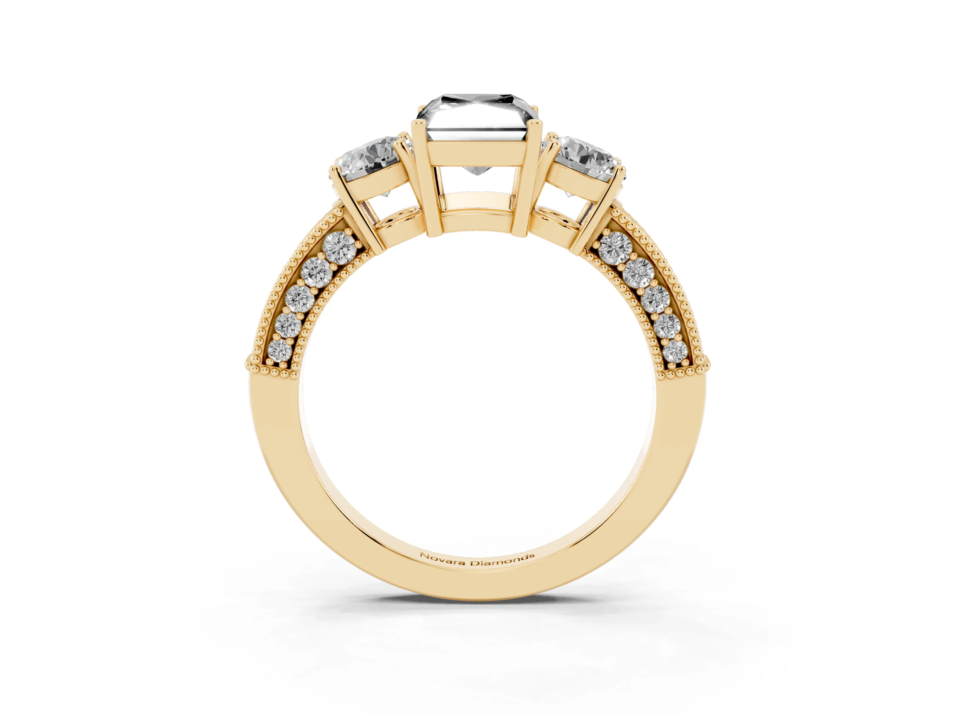 Fancy Black Radiant Cut Diamond Three-Stone Ring Set in Yellow gold with Round Side Stones and Pavé Band