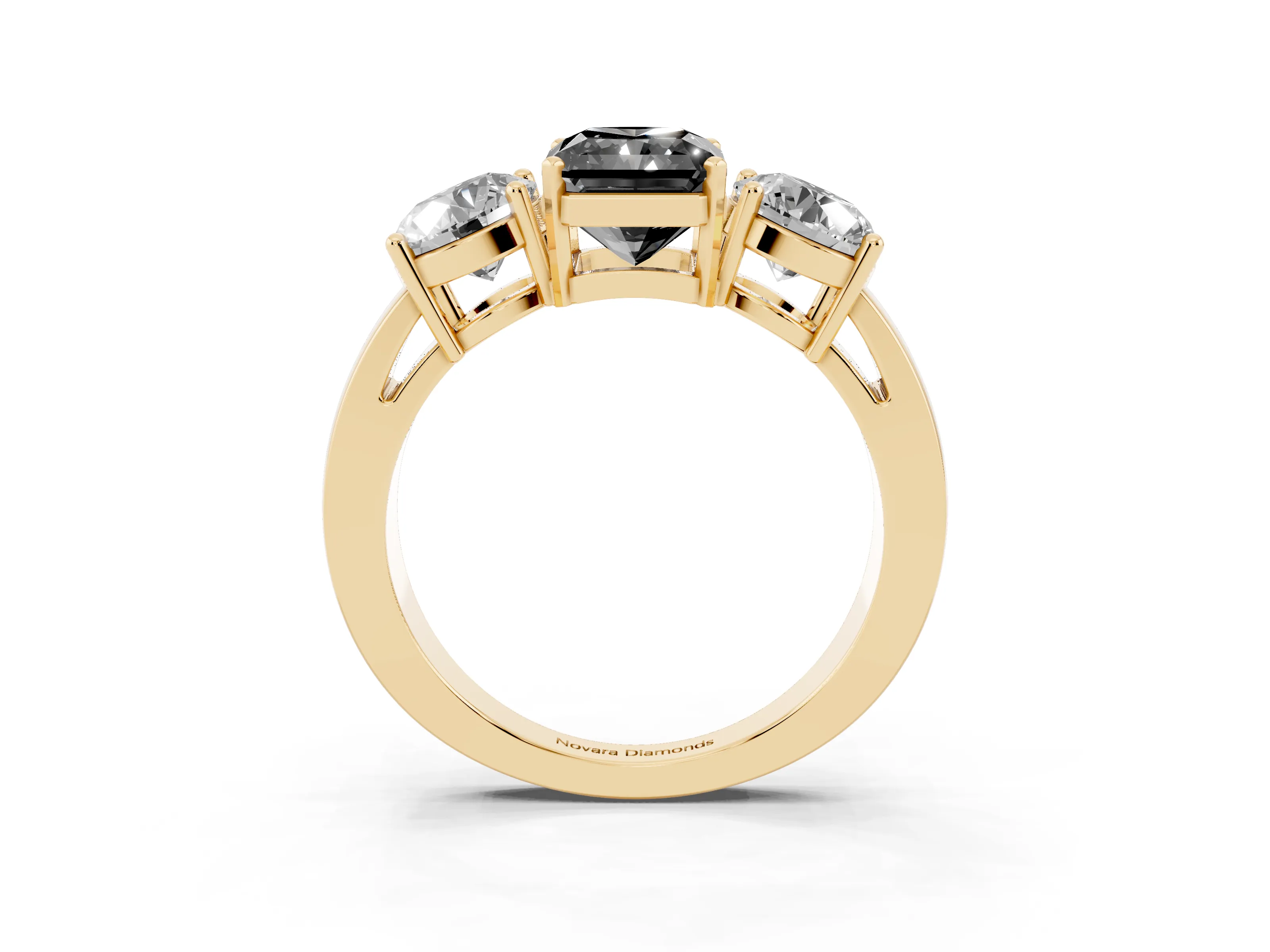 Fancy Black Radiant Cut Diamond Three-Stone Ring Set in Yellow gold with Round Side Stones and Classic Band