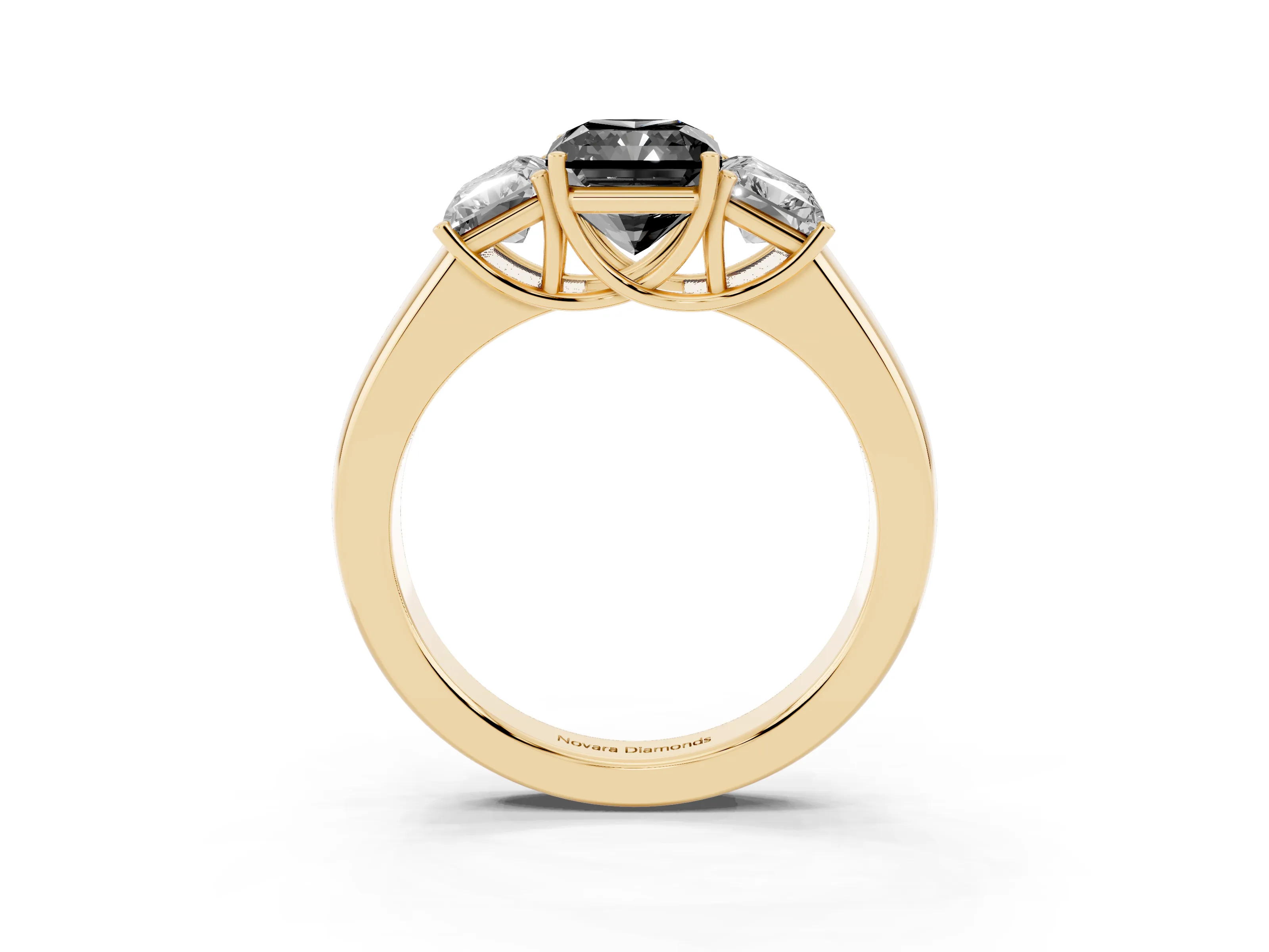 Fancy Black Three-Stone Radiant Cut Diamond Ring Set in Yellow gold with Matching Prong Settings and Plain Band