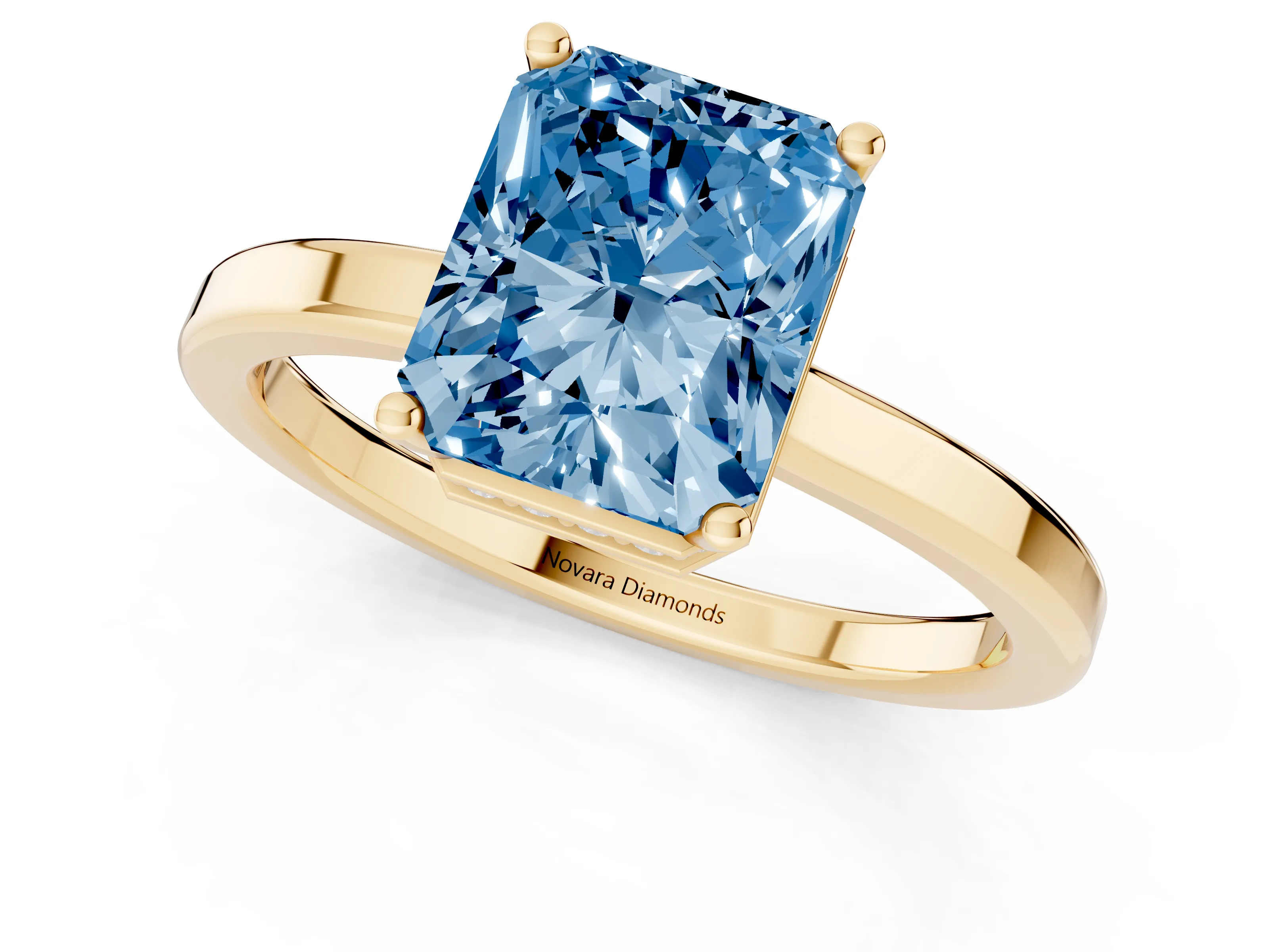Fancy Blue Radiant Cut Diamond Solitaire Engagement Ring Set in Yellow gold with Prong Setting on a Plain Band