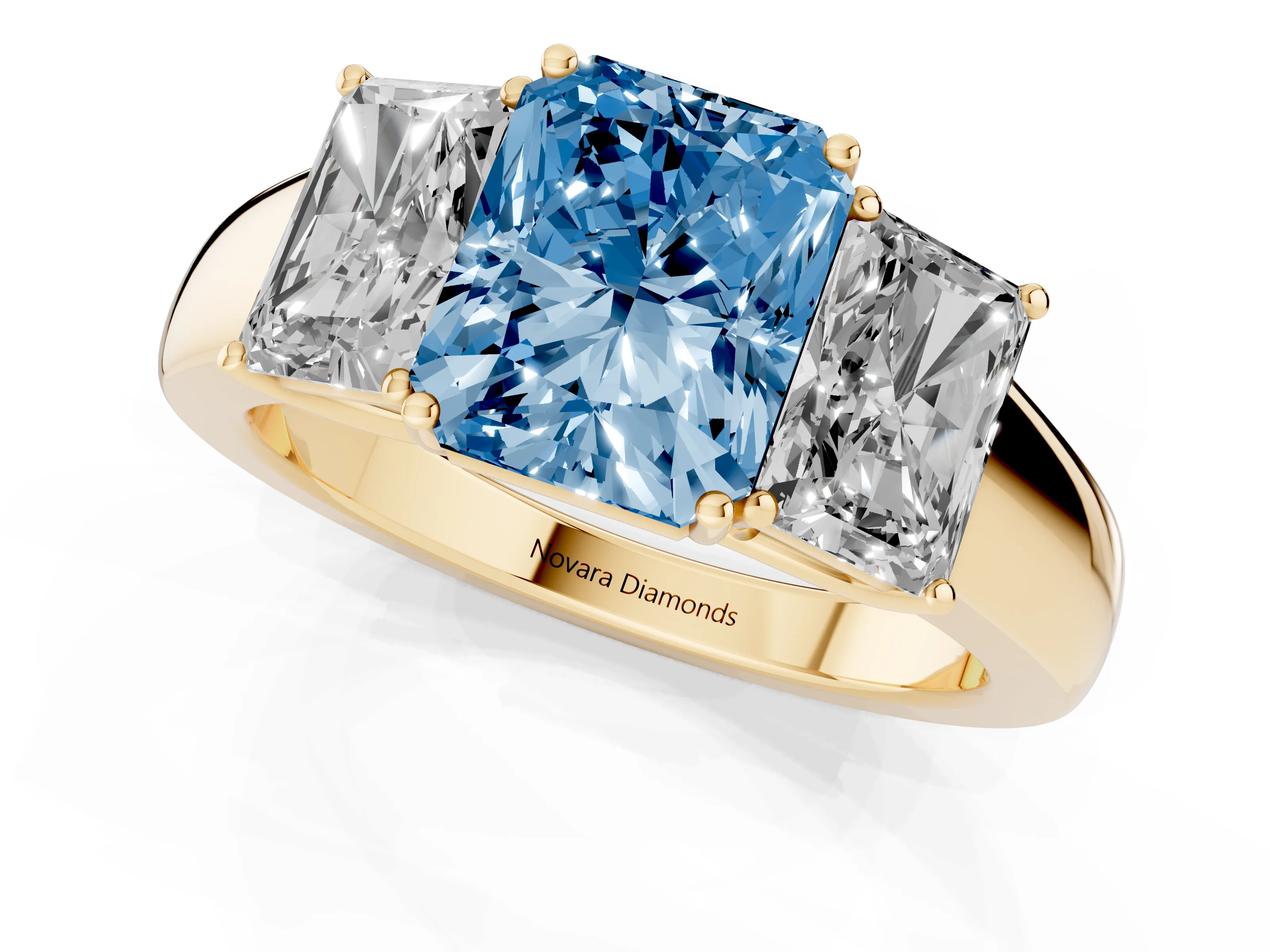 Fancy Blue Three-Stone Radiant Cut Diamond Ring Set in Yellow gold with Matching Prong Settings and Plain Band