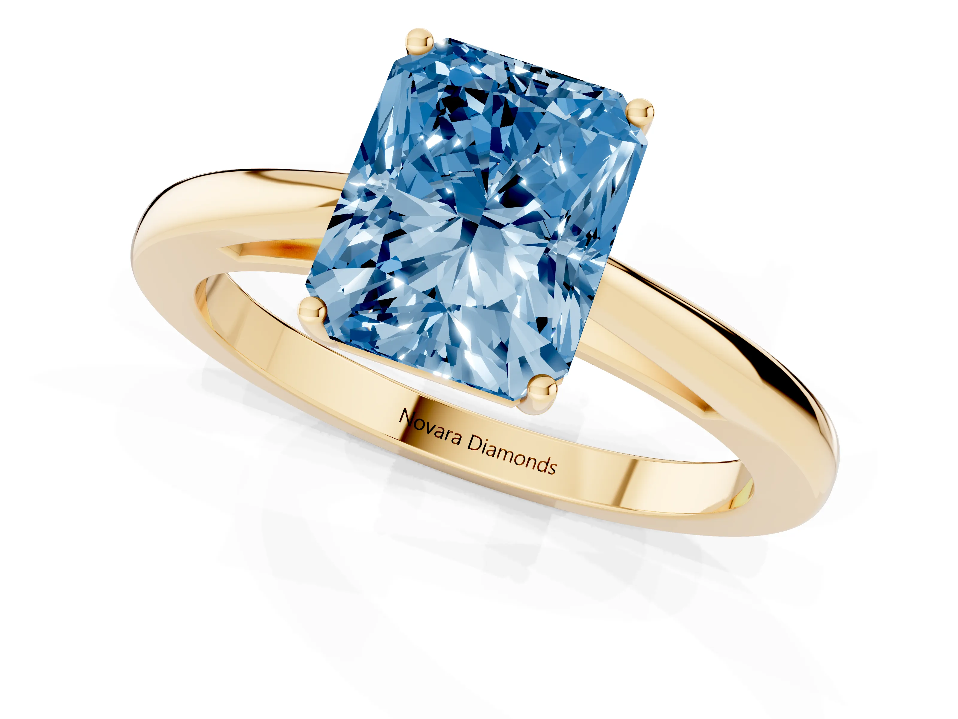 Fancy Blue Radiant Cut Diamond Solitaire Ring Set in Yellow gold with Split Shank and Prong Setting