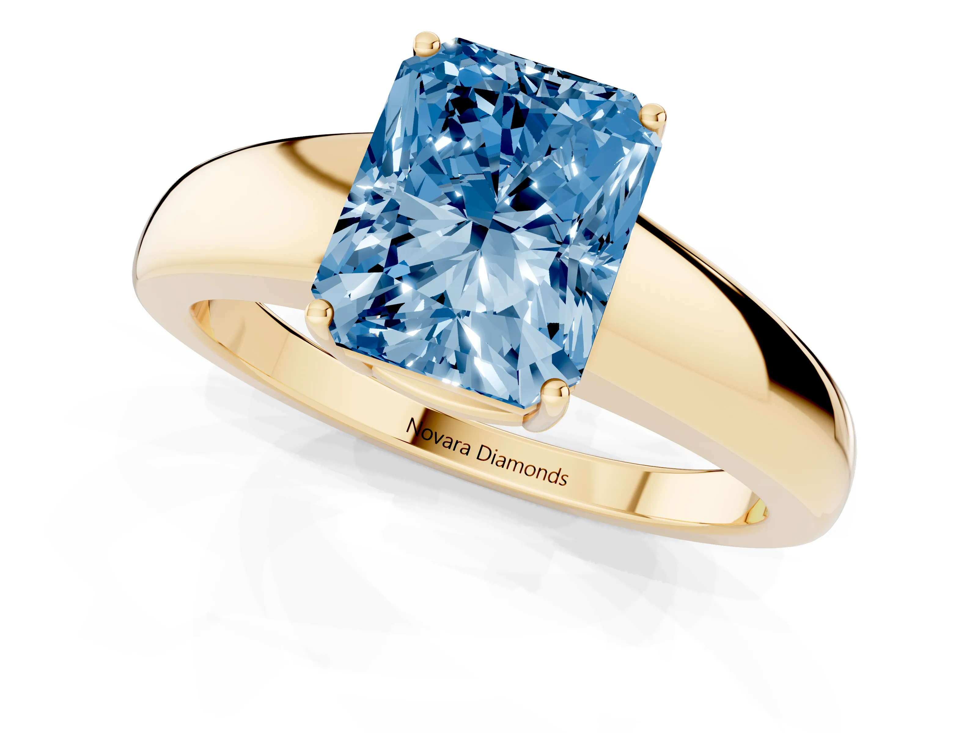 Fancy Blue Radiant Cut Diamond Solitaire Ring Set in Yellow gold with Tapered Band and Prong Setting