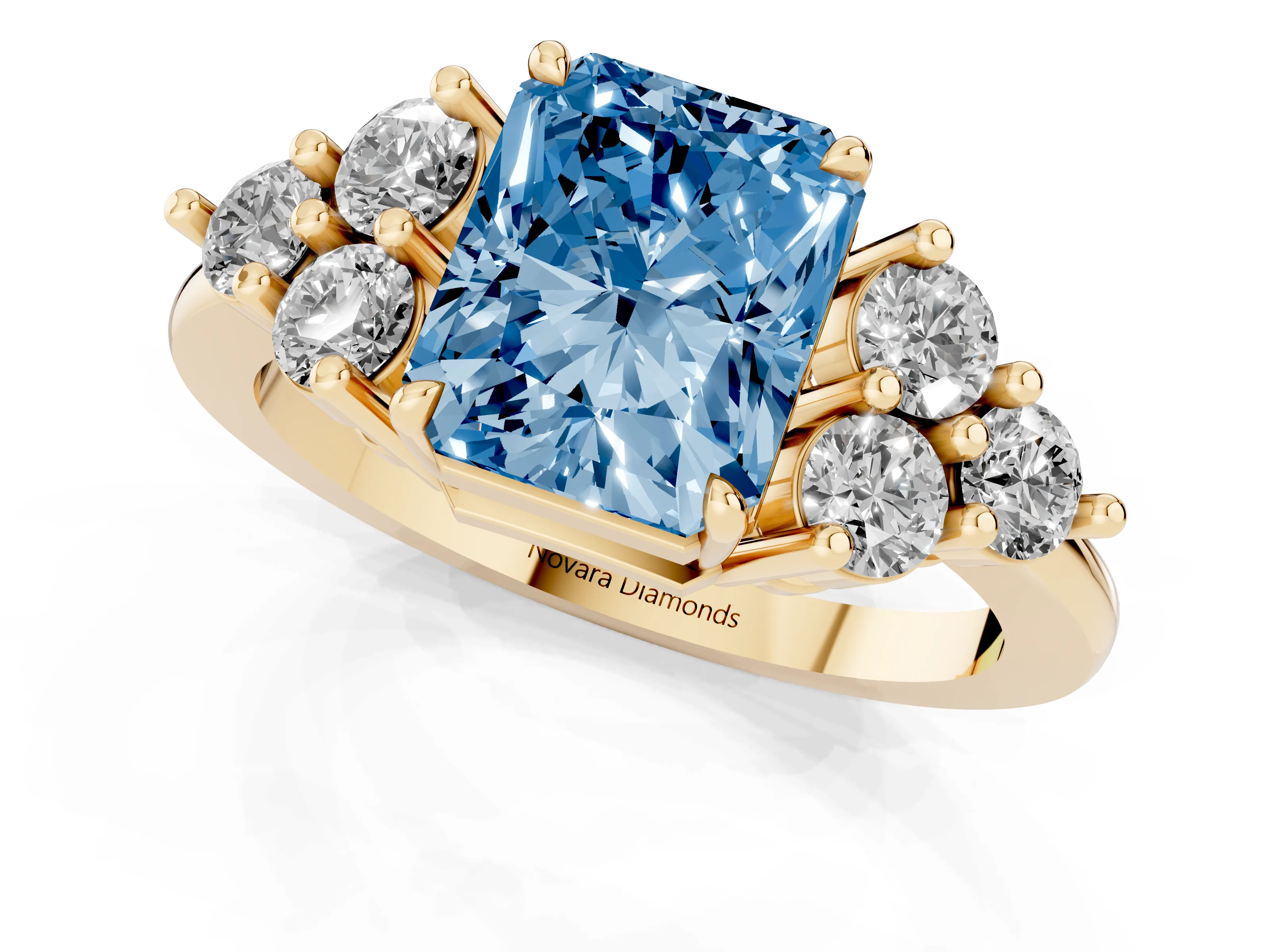Fancy Blue Radiant Cut Diamond Solitaire Ring Set in Yellow gold with Cluster Accents on Each Side